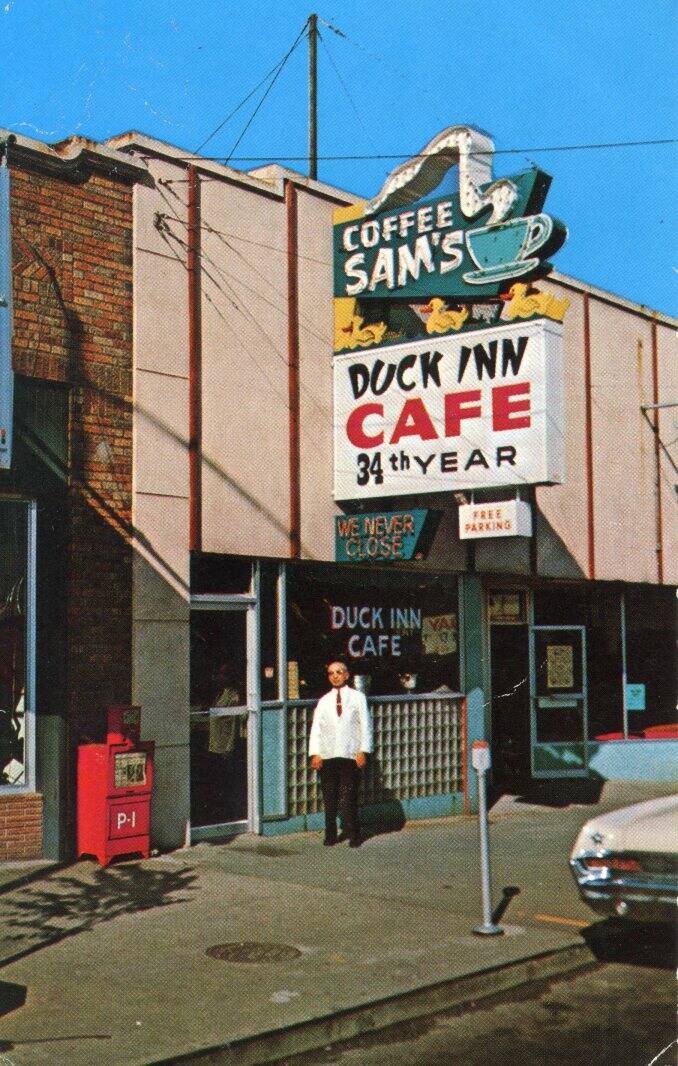 Sam Kallas standing in front of 128 E. Front St., the Duck Inn in 1968. (Submitted by John McNutt)