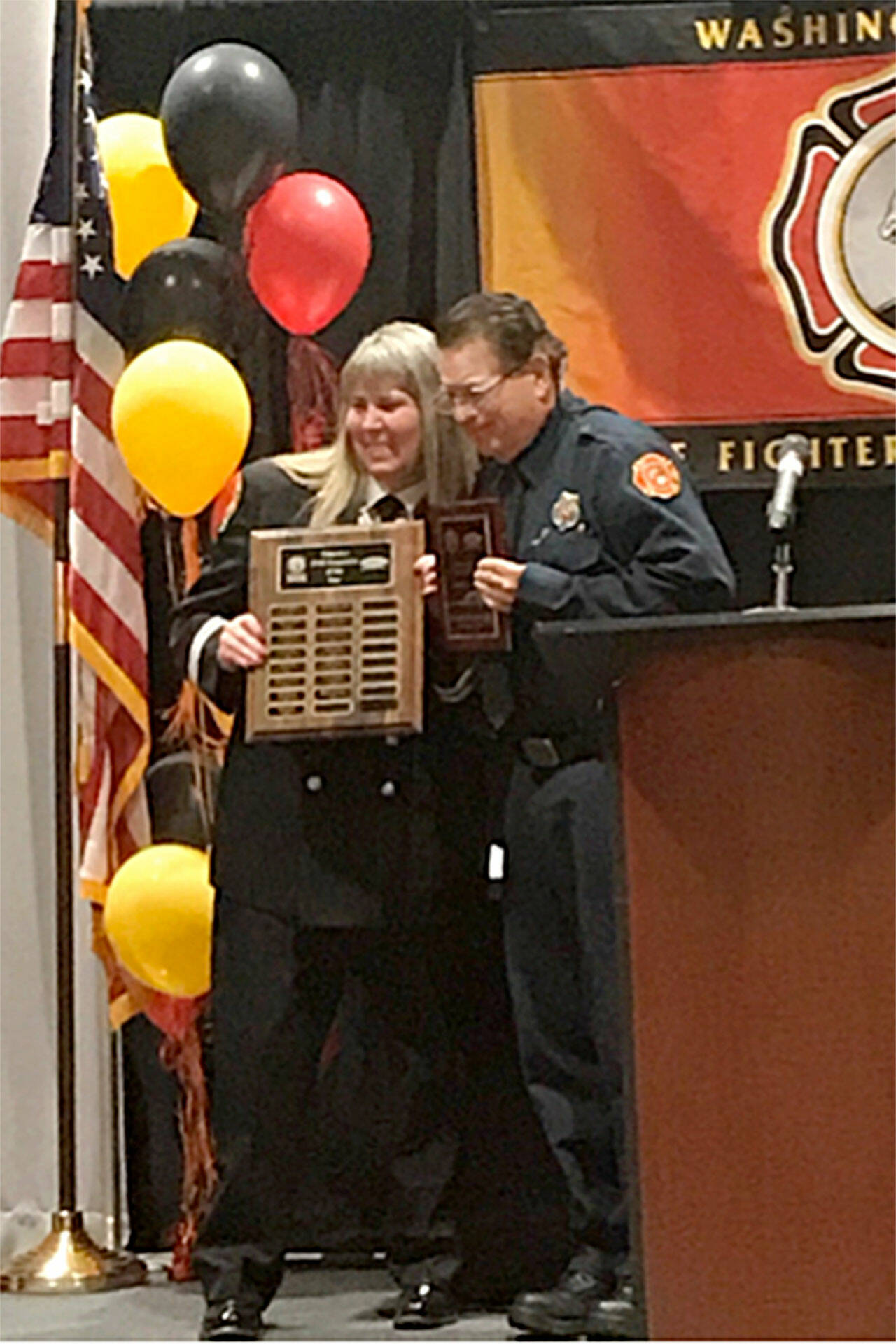 Blaine Zechenelly receives the Washington Volunteer EMS Responder of the Year award on May 20 at the Washington State Fire Fighters’ Association’s (WSFFA) 100th anniversary conference in Wenatchee. (Clallam County Fire District 3)