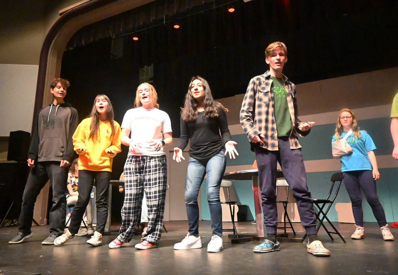 Michael Dashiell/Olympic Peninsula News Group
From left, Olympic Peninsula Academy students Malachi Byrne, Kailah Blake, Sasha Yada, Paloma Franco and Donovan Rynearson (with Lucca Shiefe in the background) rehearse a number for the upcoming production of “The Nifty Fifties.”