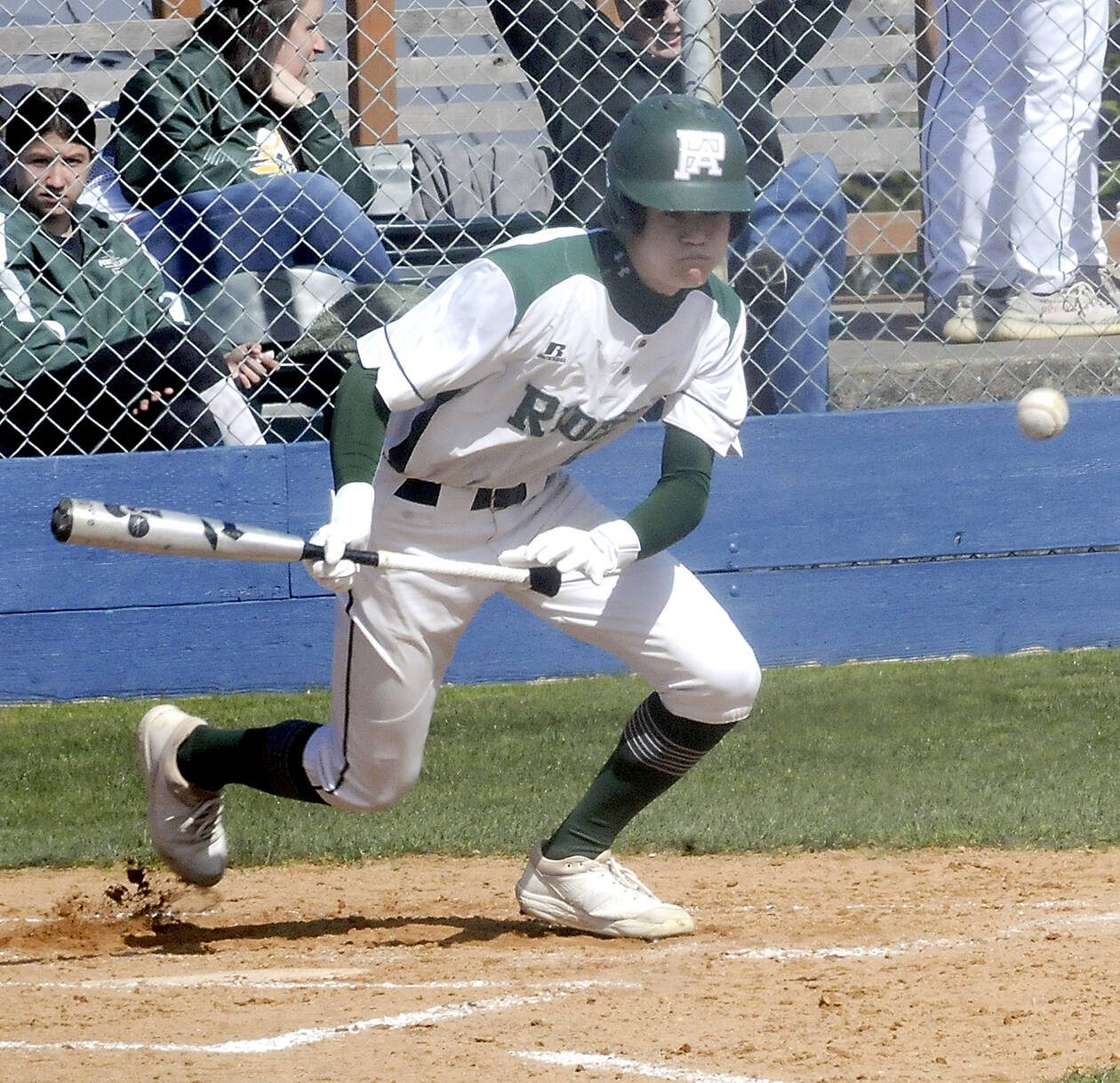 Port Angeles’ Alex Angevine bunts to advance the baserunners in the second inning against South Whidbey on Tuesday at Port Angeles Civic Field.