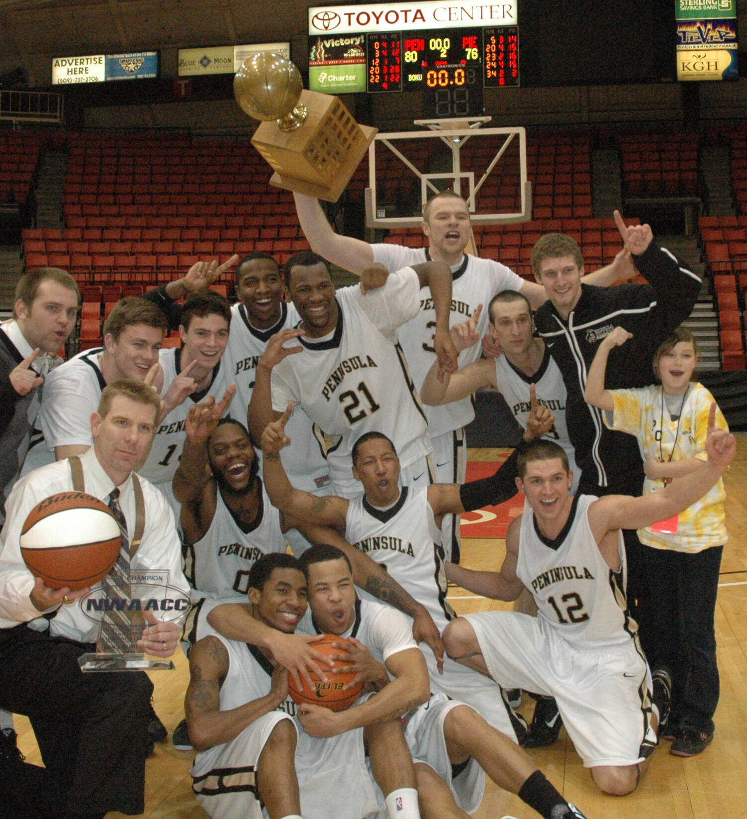 Peninsula College Athletics
Peninsula College’s 2010-11 men’s basketball team celebrates an NWAC championship.