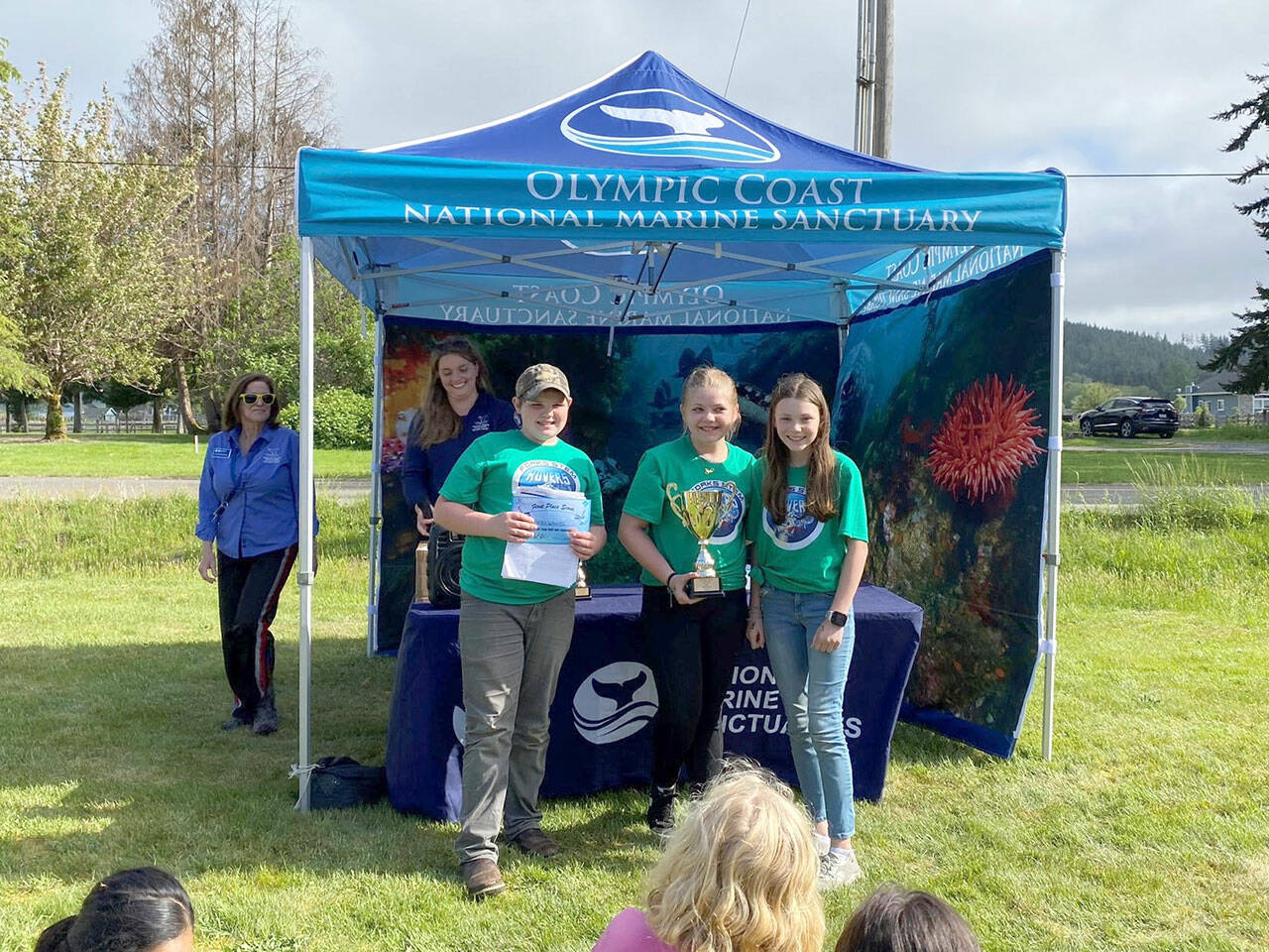 Members of the Forks Whales accept their trophy at the recent MATE ROV competition in Forks. (Photo Courtesy of NOAA)