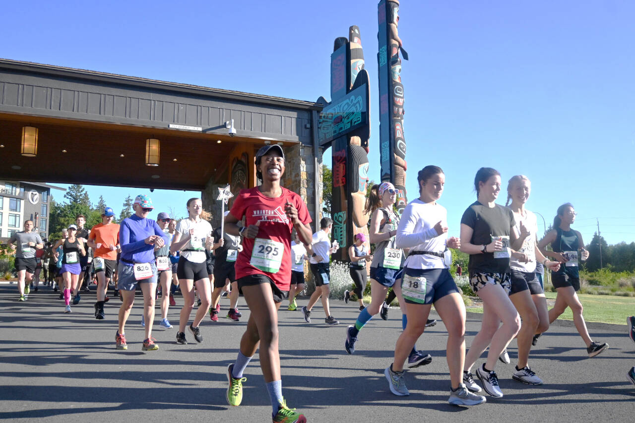 Runners take off from 7 Cedars Casino in Blyn at the start of the 2023 North Olympic Discovery Marathon. (Michael Dashiell/Olympic Peninsula News Group)