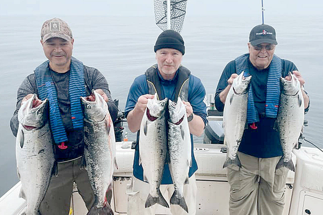 Submitted photo
The NW Region of Salmon For Soldiers is seeking boat captains to take veterans out on the water for the annual Sekiu Summer Slam salmon fishing outing on Aug. 5. These vets found success during the event in August of 2021.
