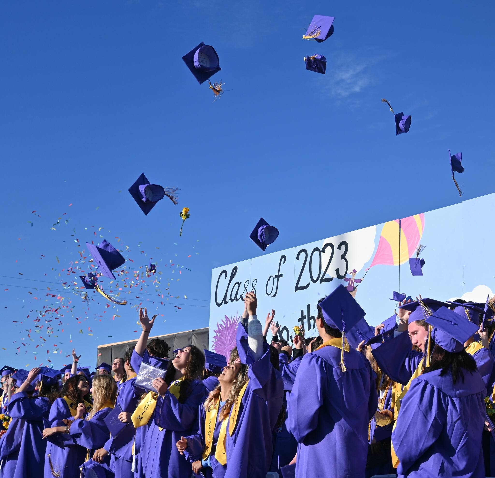 Members of Sequim High School’s Class of 2023 toss their graduation caps to the skies at the conclusion of SHS’ commencement ceremony on Friday. About 166 seniors earned their diplomas. (Michael Dashiell/Olympic Peninsula News Group)