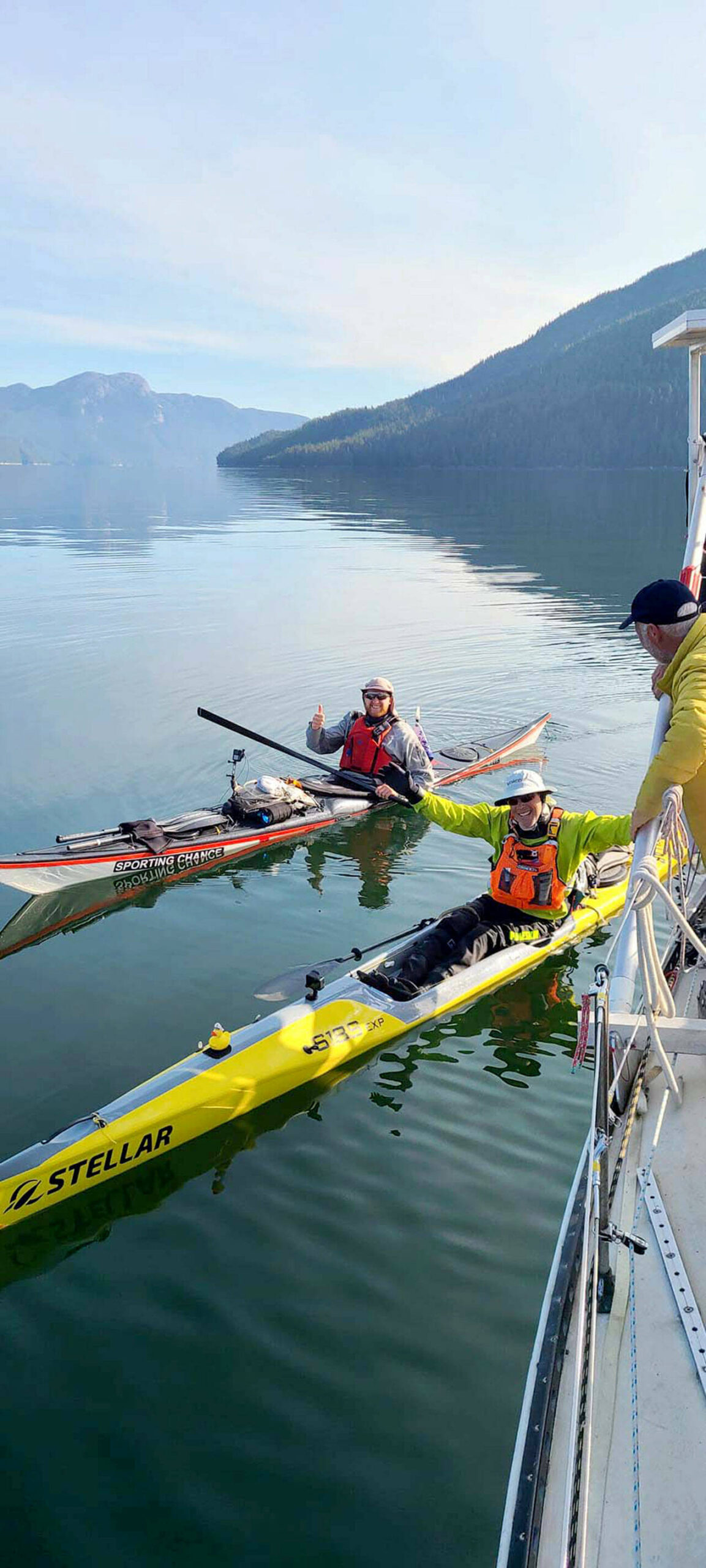 Scott MacDonald of Team Sporting Chance, left, and Stuart Sugden of Team Bella Bella and Beyond, seen near Fraser Reach, British Columbia, on Sunday, were the final two racers to complete the Race to Alaska on Tuesday. They were the 17th and 18th teams, respectively. (Northwest Maritime Center)