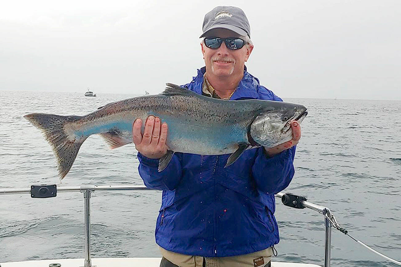Chris Chandler of Redmond, Ore. caught this hatchery chinook estimated to weight about 15 pounds, while fishing off Sekiu during a 2020 trip with Tom Burlingame's Excel Fishing Charters.