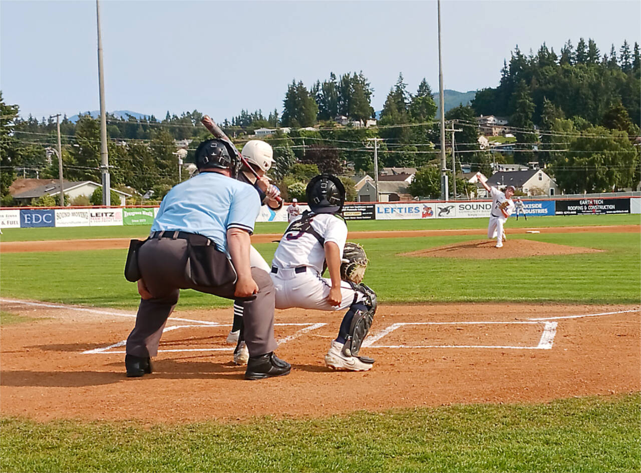 Wilder Jr.’s Brandt Perry pitches against the Stanwood Cannons on Monday at Civic Field. Perry pitched a complete-game victory as Wilder Jr. swept two from the Cannons. (Pierre LaBossiere/Peninsula Daily News)