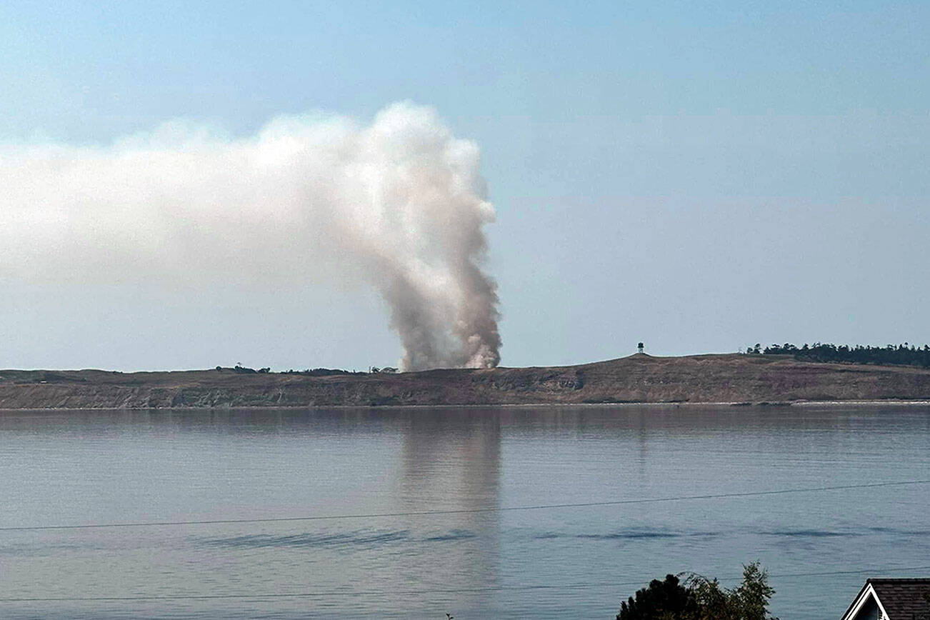 A view of Protection Island from East Jefferson County shows smoke from the fire that broke out on Wednesday. (Jefferson County Sheriff’s Office)