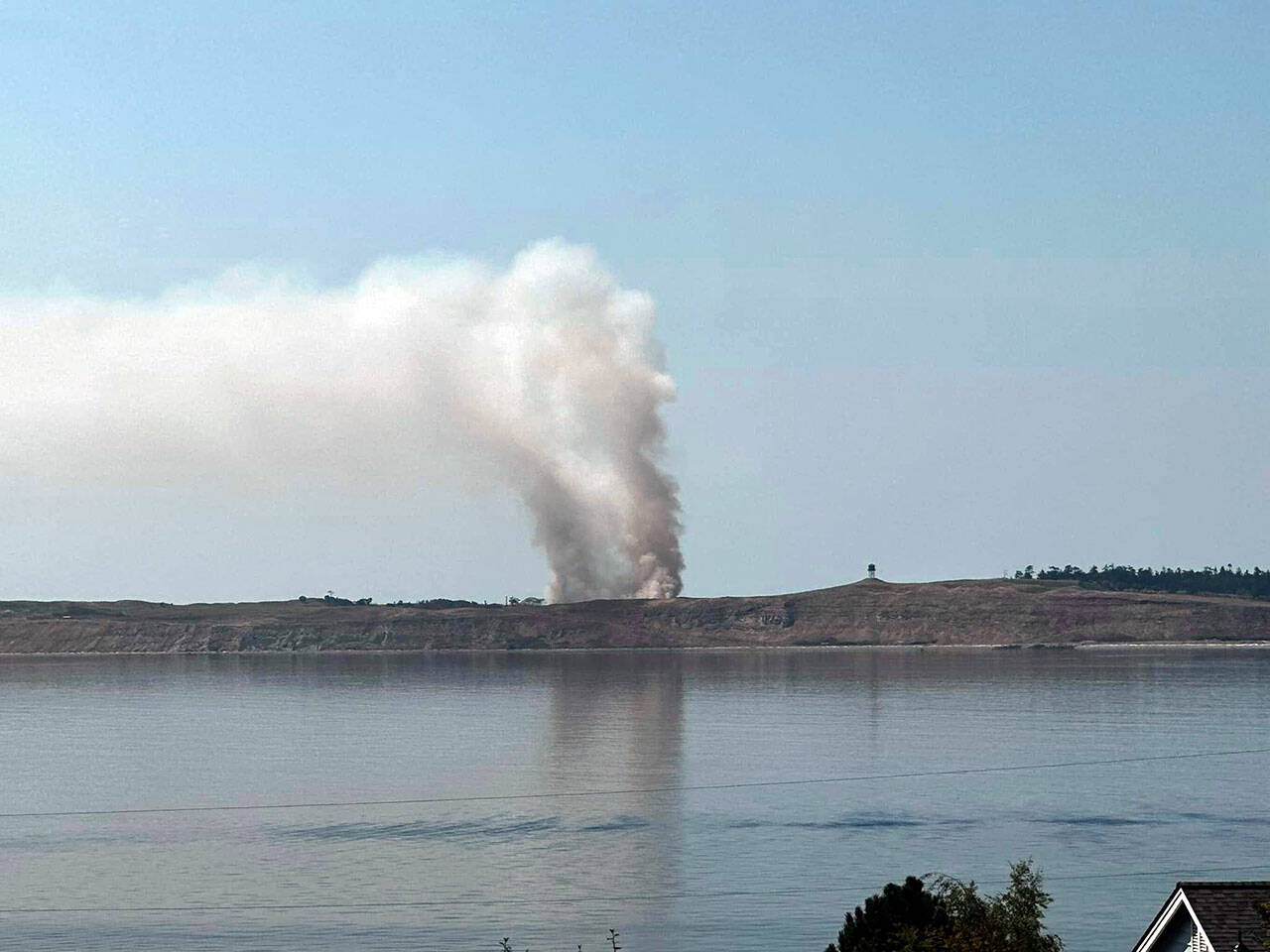 A view of Protection Island from East Jefferson County shows smoke from the fire that broke out on Wednesday. (Jefferson County Sheriffs Office)
