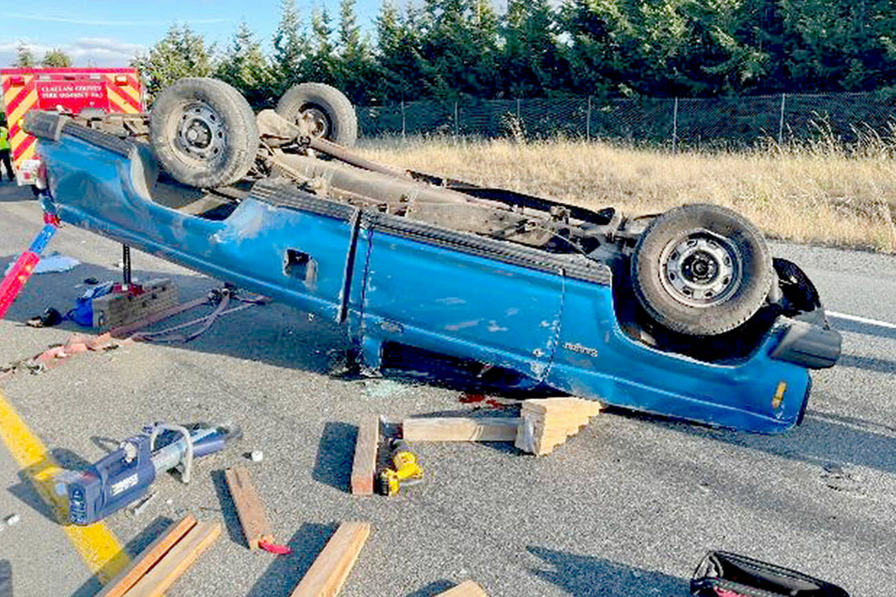 A 1983 Ford Ranger blocks the eastbound exit off Highway 101 at River Road in Sequim on Monday after the driver lost control of the vehicle. The driver, a 26-year-old Port Hadlock man, was medevacked to Harborview Medical Center in Seattle. (Courtesy photo /. Clallam County Fire District 3)