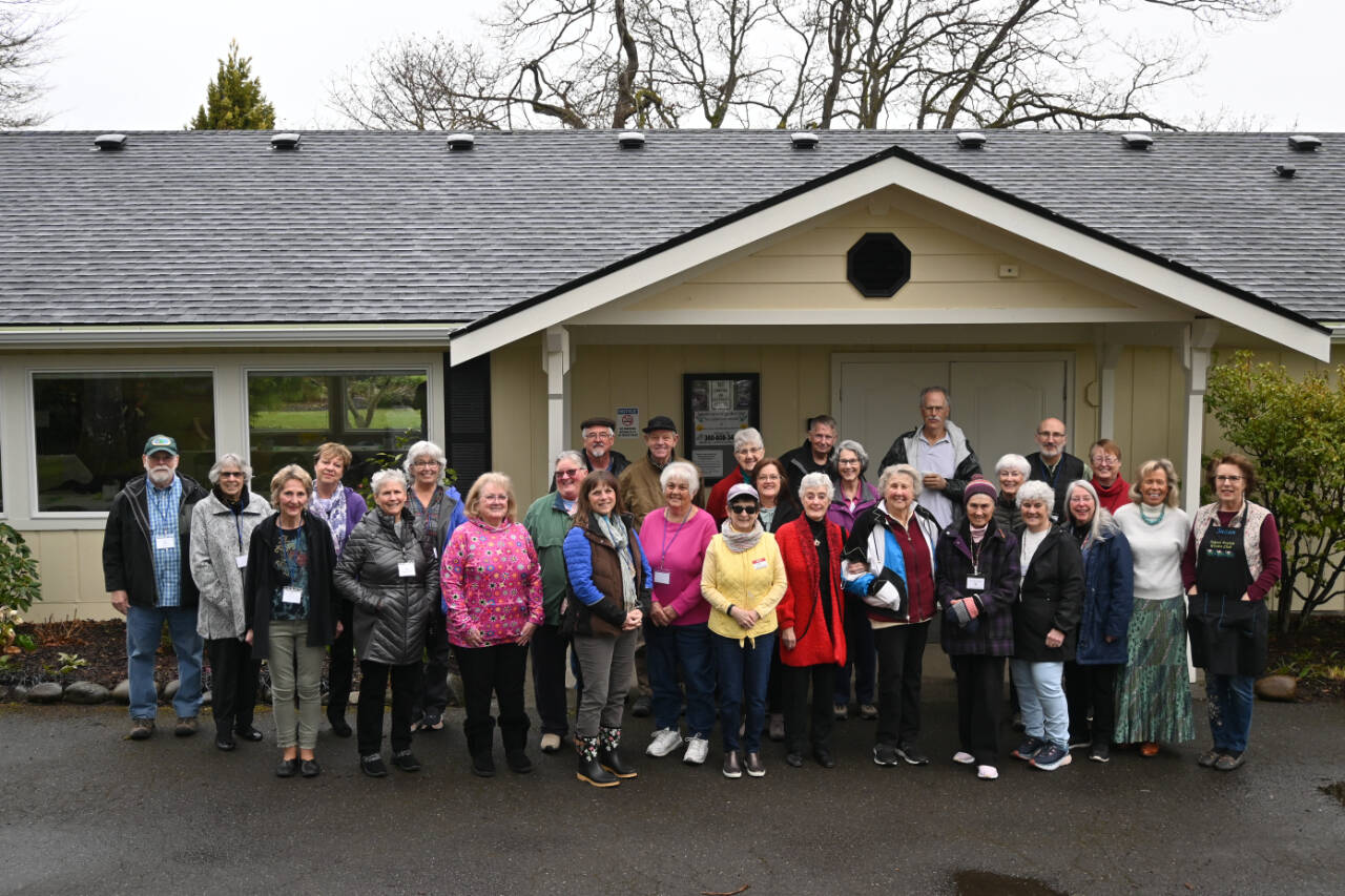 Members of the Sequim Prairie Garden Club (SPGC) gather outside the recently renovated clubhouse at Pioneer Memorial Park. Club members say they are excited to celebrate SPGC’s 75th year with a community party set for Saturday. (Michael Dashiell/Olympic Peninsula News Group)