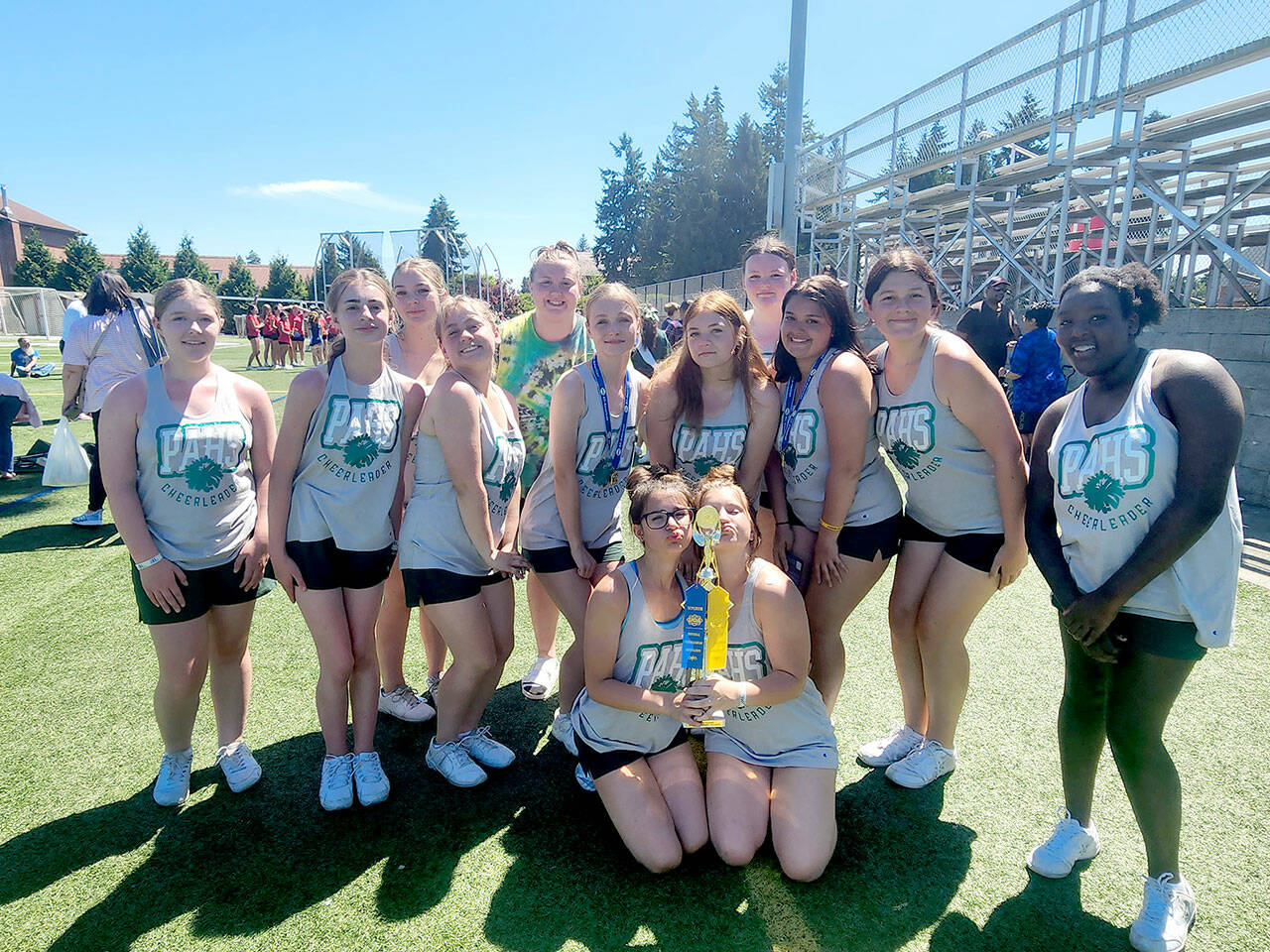 The Port Angeles High School Cheer program earned first place in the Cheer Small Varsity Division and also was awarded a spirit stick for their hard work at Universal Cheerleaders Association camp at University of Puget Sound in July. Team members are: Abby Cuellar, Addisen McNeece, Ailey Thibeault, Anna Possinger, Ava Fox, Ella Garcelon, Hannah Martin, Jordyn Erdmann, Julia McDonald, Madison Bishop, Mylee Soiseth, Naomi Wait, Tish Hamilton. The Riders are coached by DaLasa Doane.