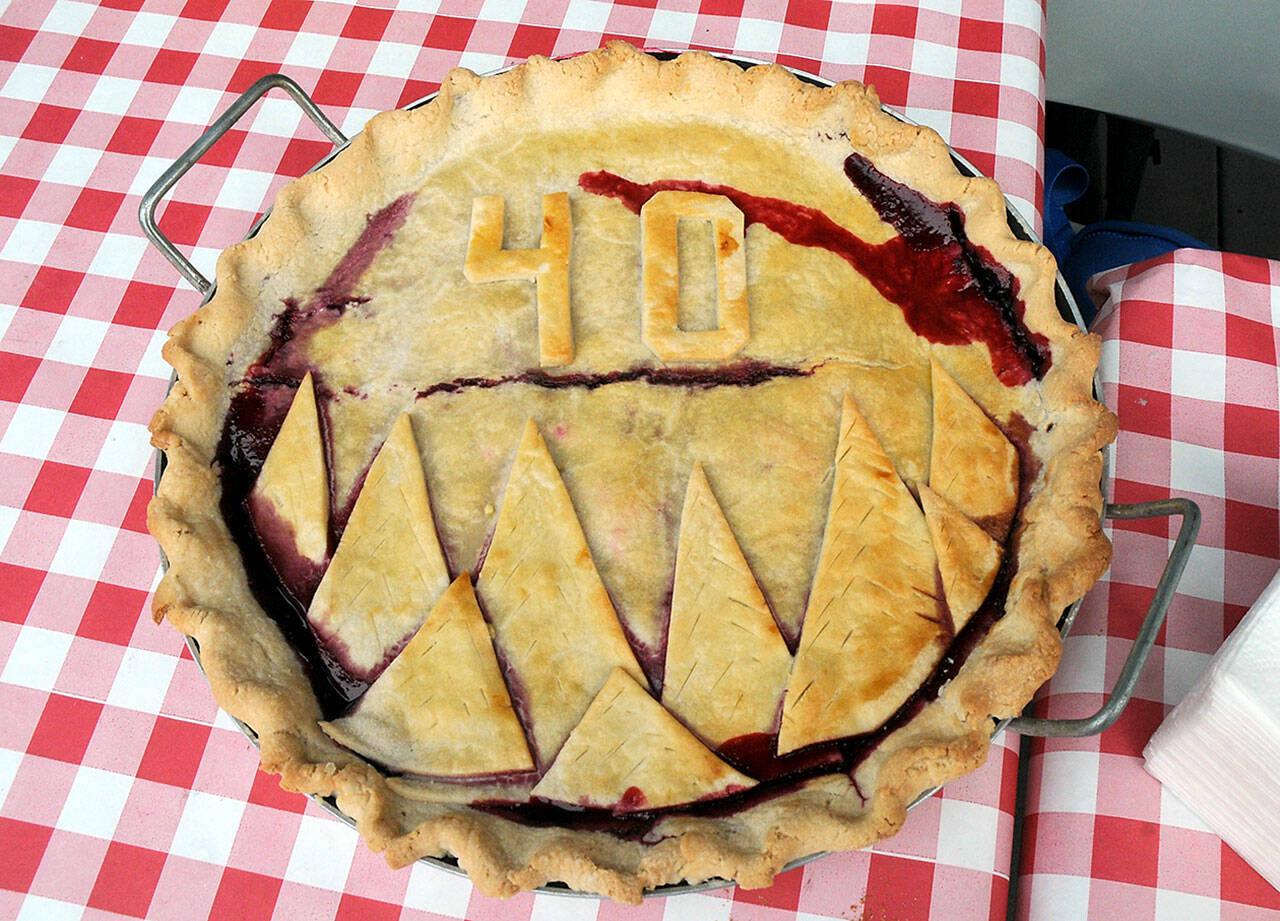 A special 40th anniversary pie celebrates the origins of the Joyce Daze Blackberry Festival. The pie was to be donated to the musicians who performed at Saturday’s event. (Keith Thorpe/Peninsula Daily News)
