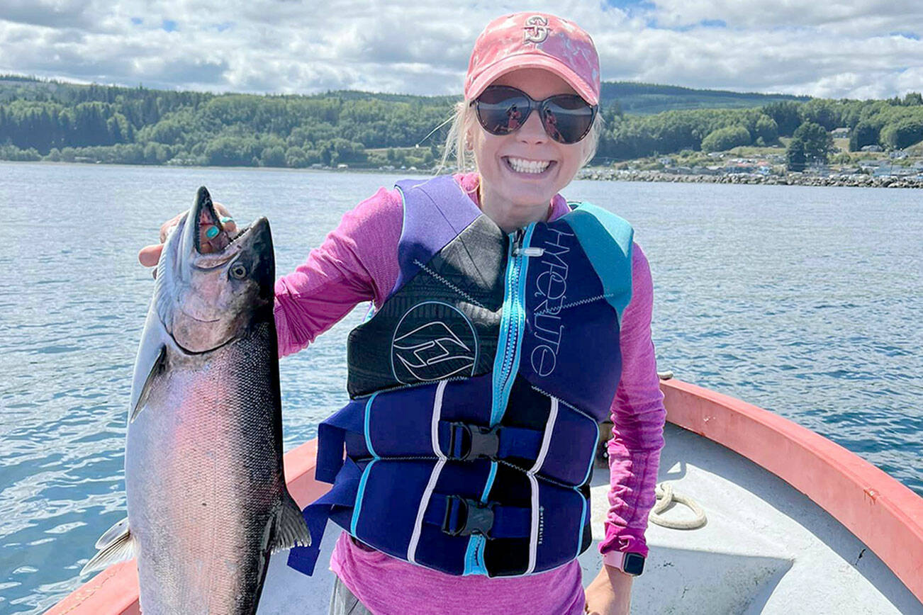 Lake Stevens' Chelsey Schiessl reeled in her first-ever king while fishing out of Van Ripers' Resort in Sekiu with her husband MatthewSchiessl.