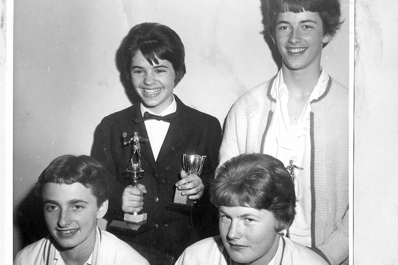 Members of the Port Angeles Junior Badminton team, from left, Tyna Barinaga, Caroline Jensen; back row, Judy Brodhun and Susie Childers were part of a squad that won an unprecedented 11 nationals titles as well as three second-place finishes in the 1964 Junior Nationals Tournament held in Pomona, Callif. Port Angeles players reached the finals 12 of 15 events.