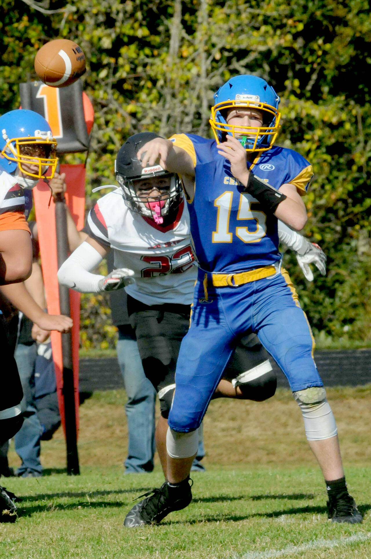 Henry Bourm (15) will be sharing quarterback duties with Conner Bauers for the Crescent Loggers. (Keith Thorpe/Peninsula Daily News)