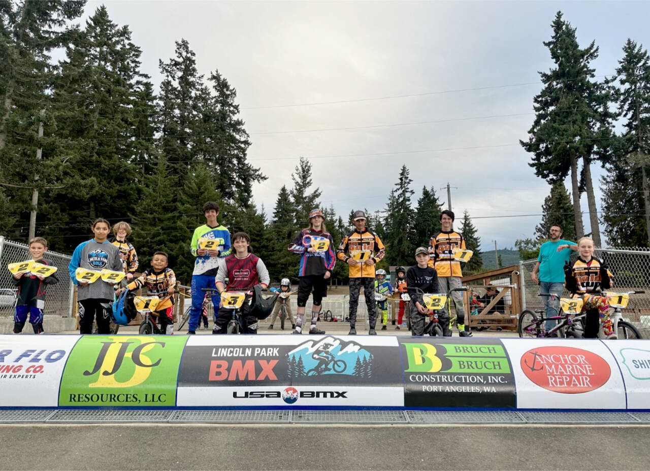 These Lincoln Park BMX racers recently won Gold Cup plates at the Northwest Gold Cup Finals held in Richland. From left, are Bradan Gray, Trinity Gaither, Thomas Schreoeder, Carmelo Kompkoff, Caleb Underwood, Toby Kreider, Jackson Beal, Gabe Granum, Ryker Rossi, Ryan Albin, Teyah Elofson-Cross. Not in the picture are Thomas Penn, Keira Keller and Anthony Hulse. (Lincoln Park BMX)