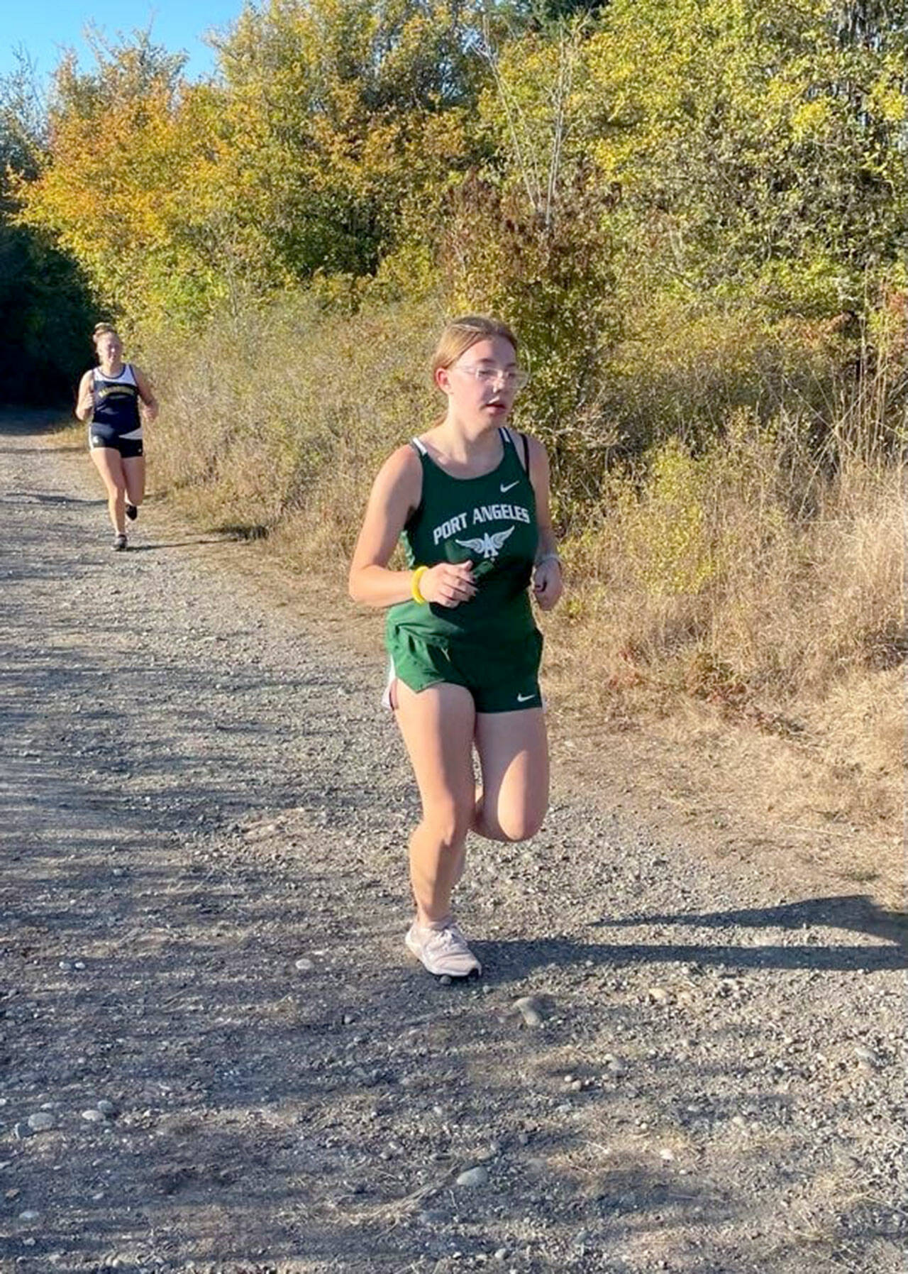 Angie Gooding/Port Angeles Cross Country
Port Angeles' Leka Moniz powers to the finish line during an Olympic League Cross Country meet at Dungeness Recreation Area on Wednesday.