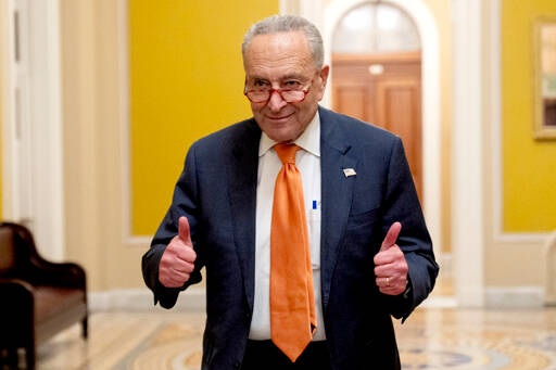 Senate Majority Leader Chuck Schumer, D-N.Y., gives two thumbs up as the Senate votes to approve a 45-day funding bill to keep federal agencies open on Saturday in Washington. (Andrew Harnik/The Associated Press)