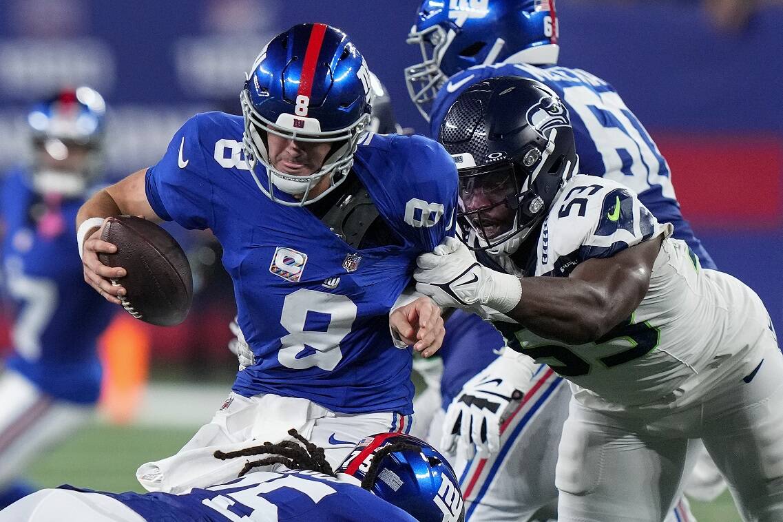New York Giants quarterback Daniel Jones (8) is sacked by Seattle Seahawks linebacker Boye Mafe (53) during the fourth quarter of an NFL football game, Monday, Oct. 2, 2023, in East Rutherford, N.J. (AP Photo/Frank Franklin II)