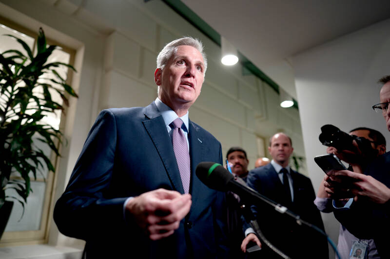 Speaker of the House Kevin McCarthy, R-Calif., talks to reporters after a closed-door meeting with Rep. Matt Gaetz, R-Fla., and other House Republicans after Gaetz filed a motion to oust McCarthy from his leadership role at the Capitol in Washington on Tuesday. (J. Scott Applewhite/The Associated Press)