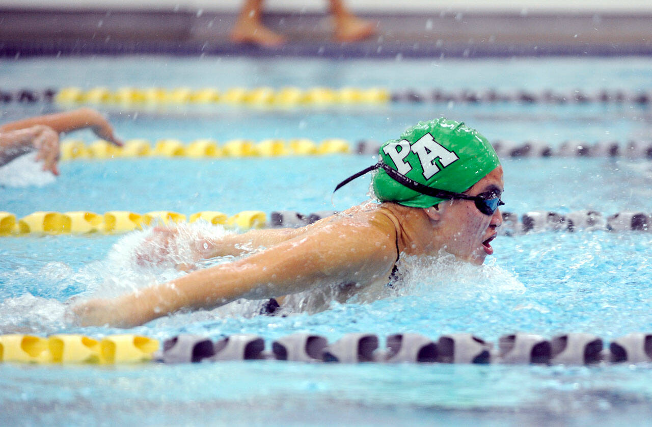 Michael Dashiell/Olympic Peninsula News Group Port Angeles’ Yau Fu swims to a state qualifying time and a meet victory in the 100-yard butterfly on Wednesday at the Sequim YMCA.