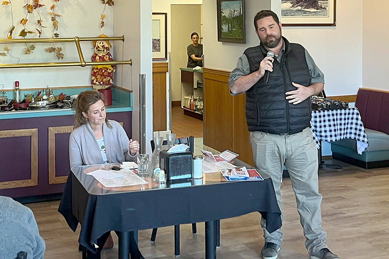 Port Angeles Deputy Mayor Brendan Meyer, right, speaks to a meeting of the Port Angeles Kiwanis Club Thursday alongside his opponent, Kalli Mae Jones, who’s challenging Meyer for his Position 7 seat on the Port Angles City Council. (Peter Segall/Peninsula Daily News)