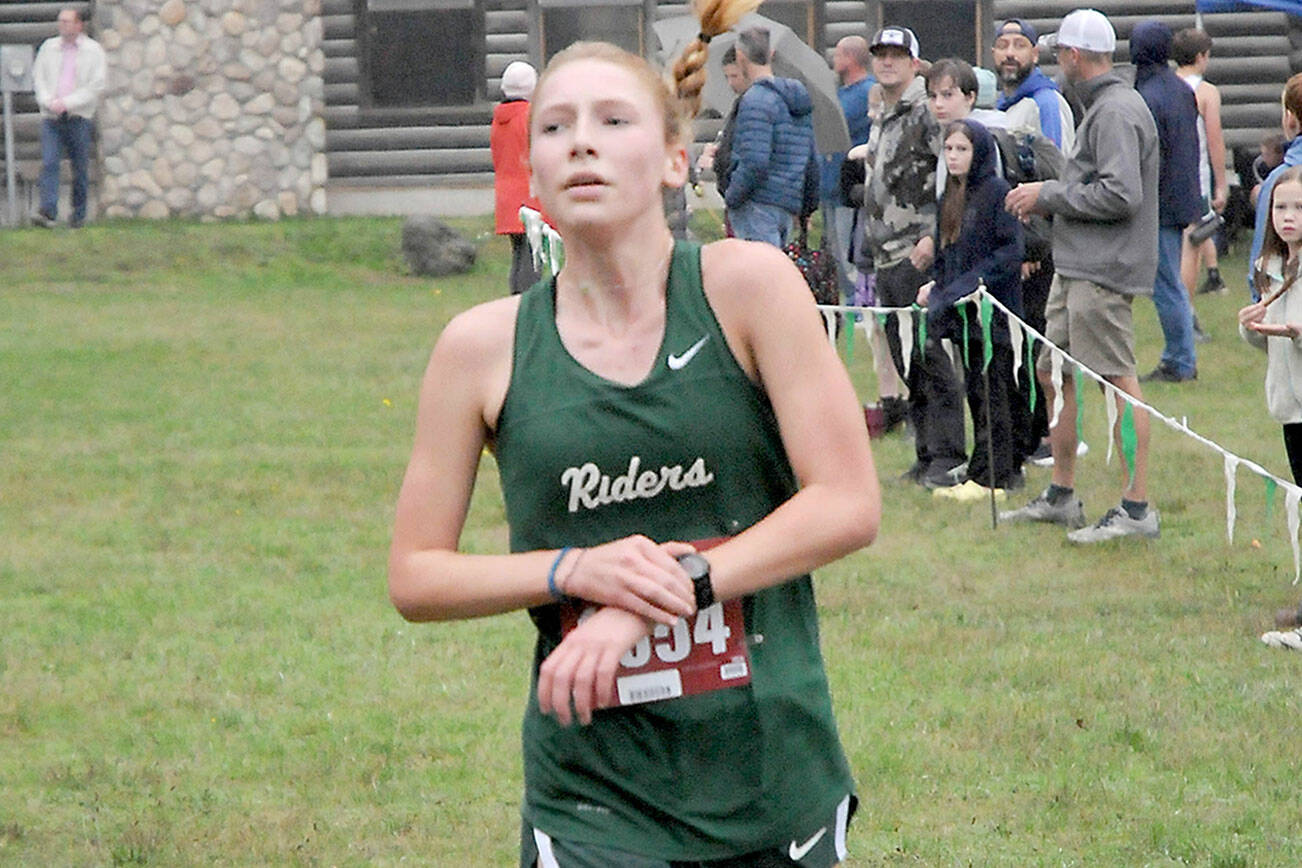 KEITH THORPE/PENINSULA DAILY NEWS
Leia Larson of Port Angeles takes thrid place in Thursday's Olympic League Championships at Lincoln Park.