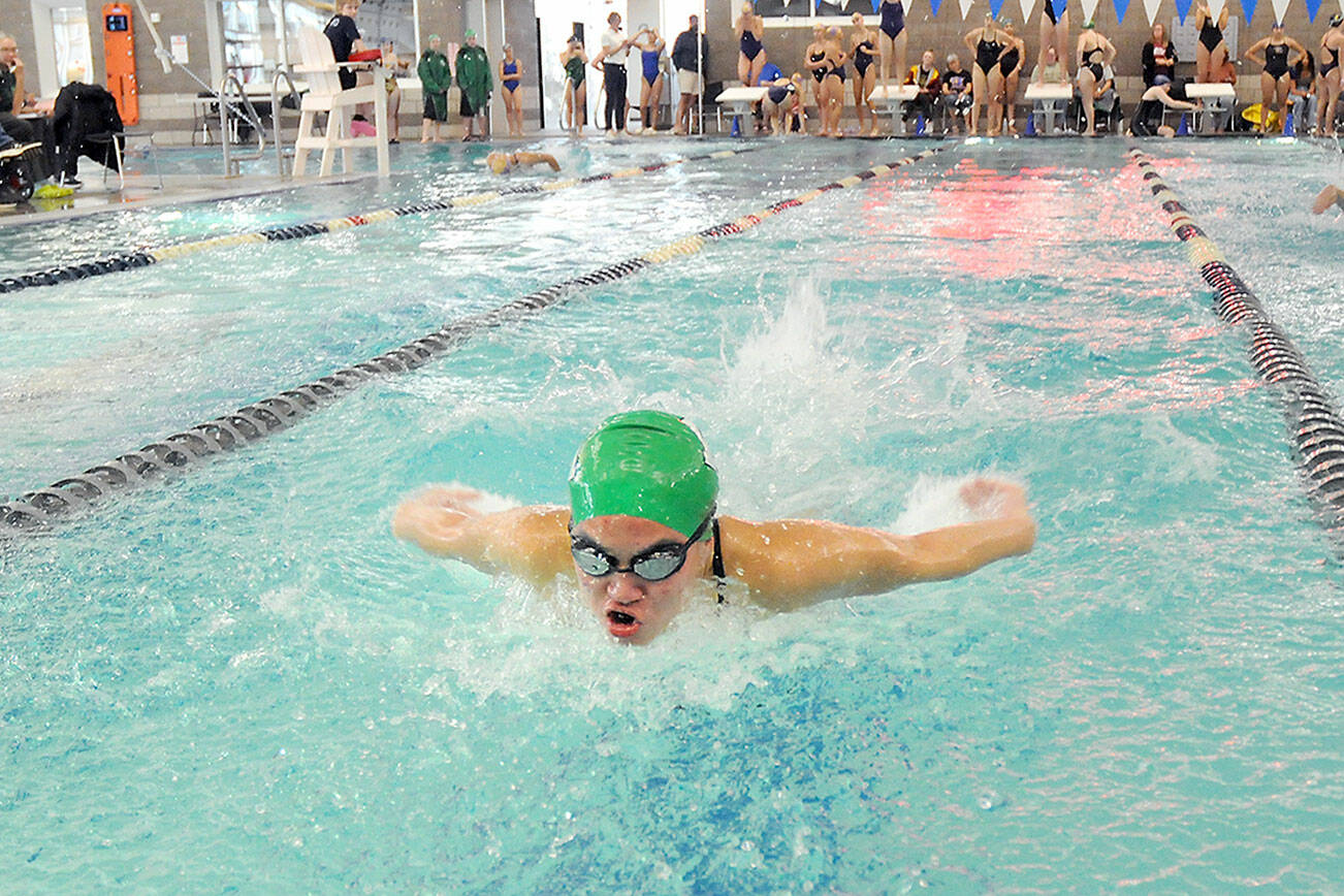 Yau Fu of Port Angeles swims the butterfly leg of the 200-yard individual medley on Wednesday in Port Angeles. (Keith Thorpe/Peninsula Daily News)