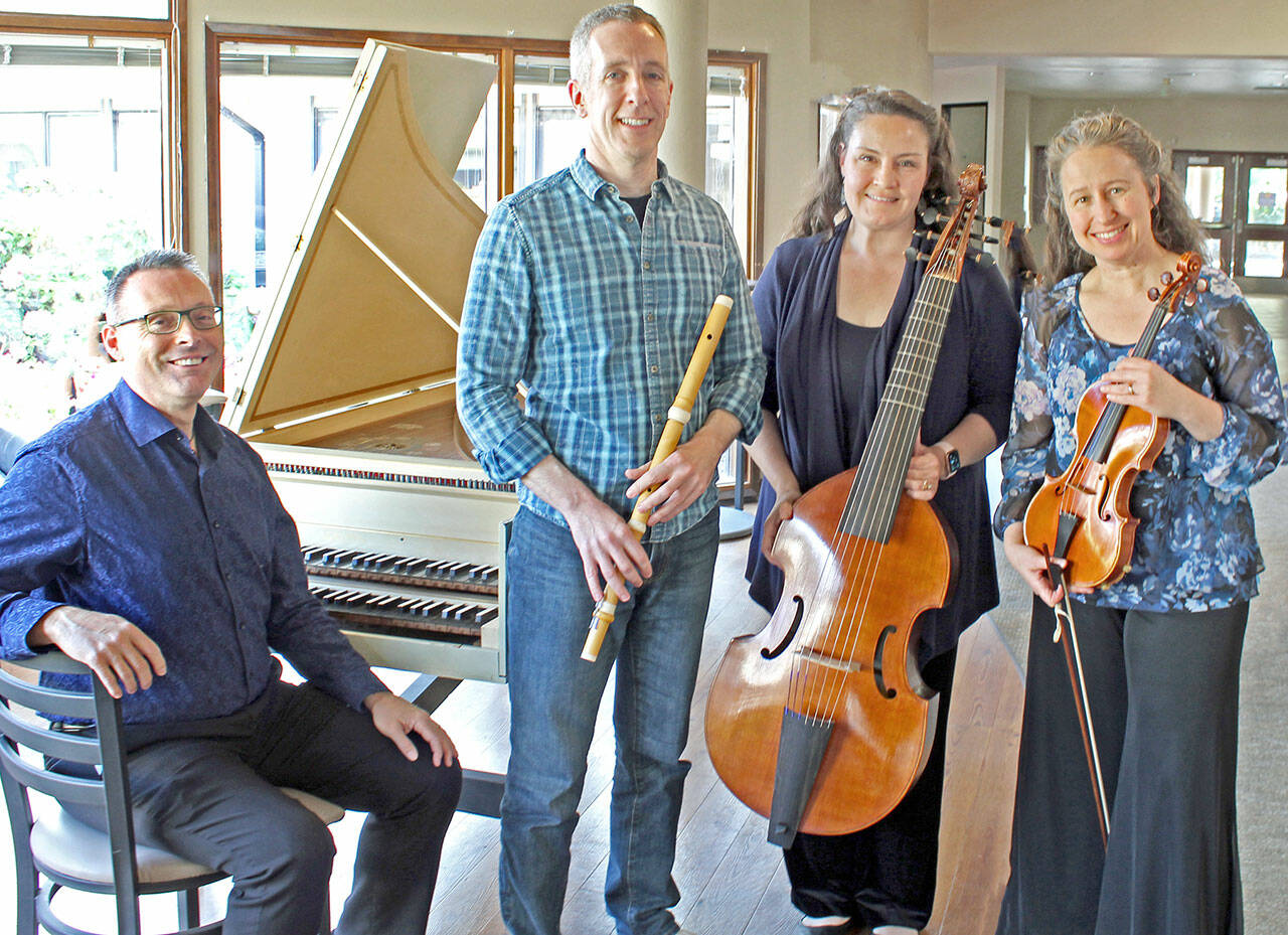 Performing Saturday at the Quimper Grange are, from left, Randall Wilkens, Miguel Rodé, Amy Warren and Bonnie Wilkens. Not pictured is Lee Inman.