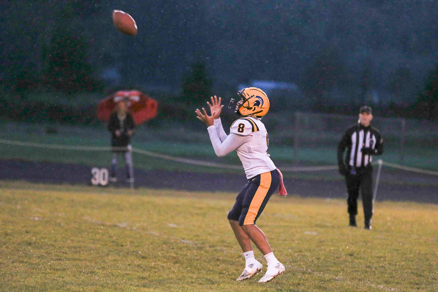 Bubba Hernandez catches a punt during the first half of Forks' 20-7 loss to Onalaska in a district crossover on Nov. 3. (Josh Kirshenbaum/The Chronicle)