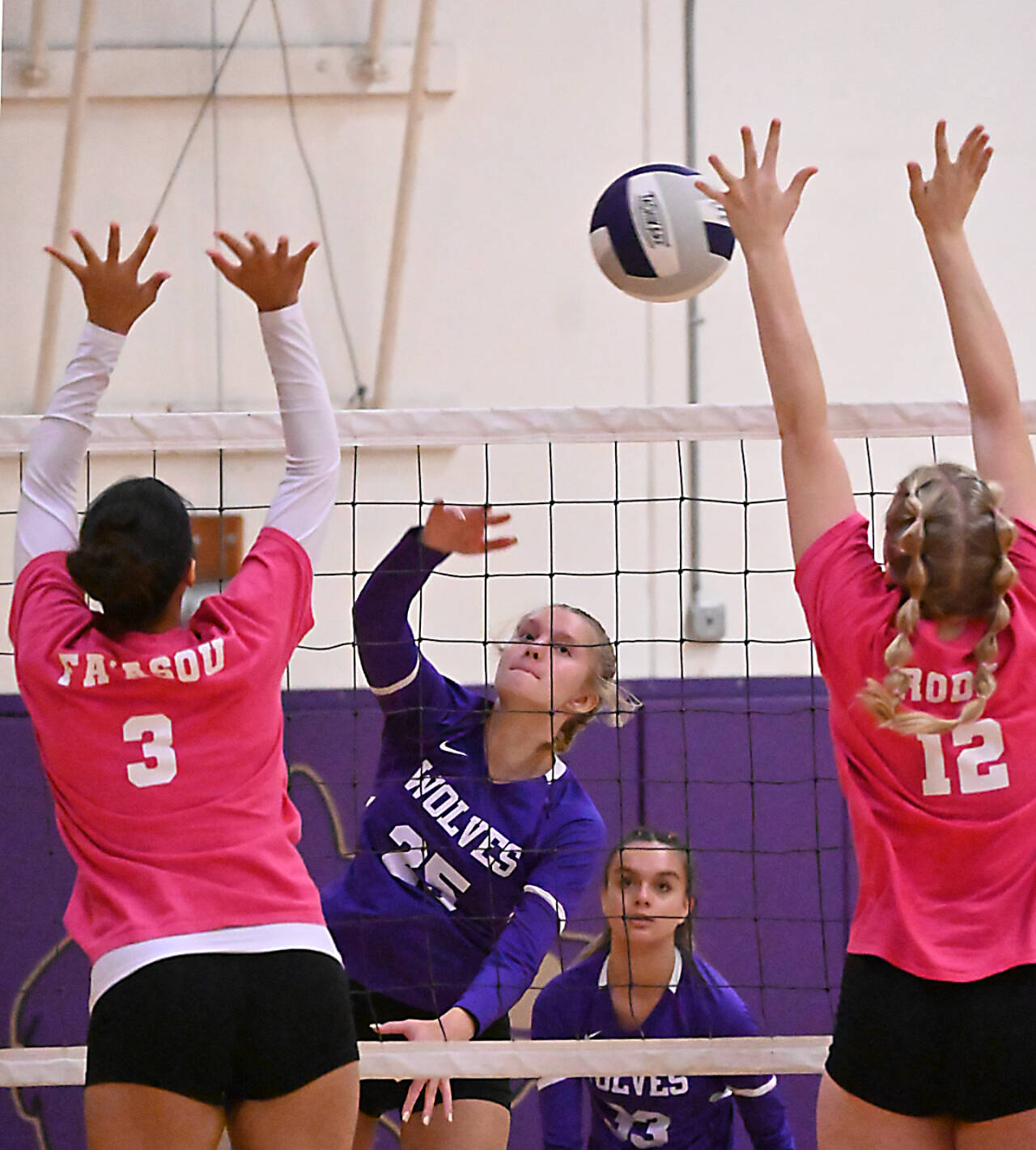 Sequim’s Jolene Vaara (25) and Arianna Stovall (33) were both named to the Olympic League first team for volleyball. (Michael Dashiell/Olympic Peninsula News Group)