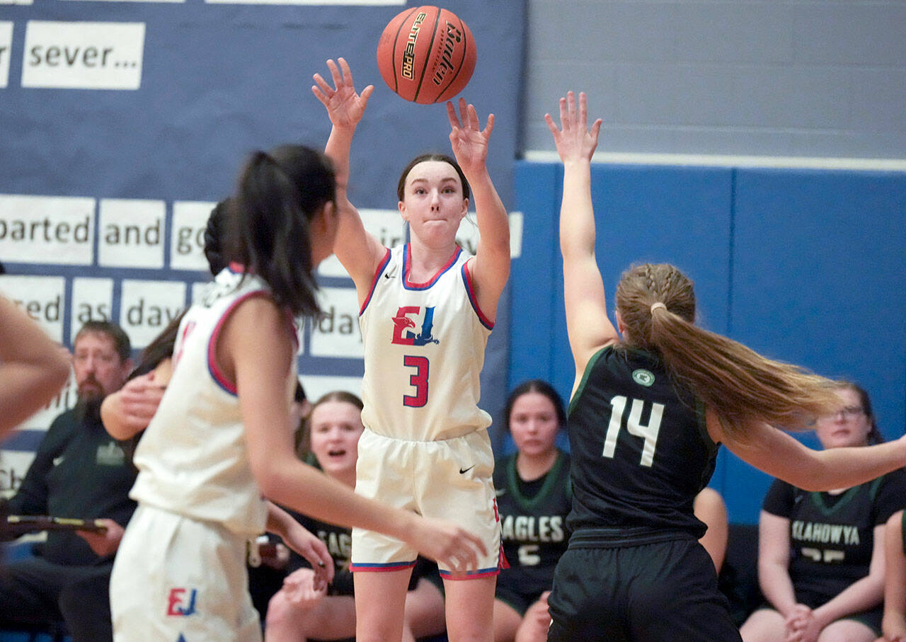 Steve Mullensky/for Peninsula Daily News East Jefferson Rival Kay Botkin shoots for a three pointer from outside the key during a Nisqually League game played in Chimacum against the Klahowya Eagle.