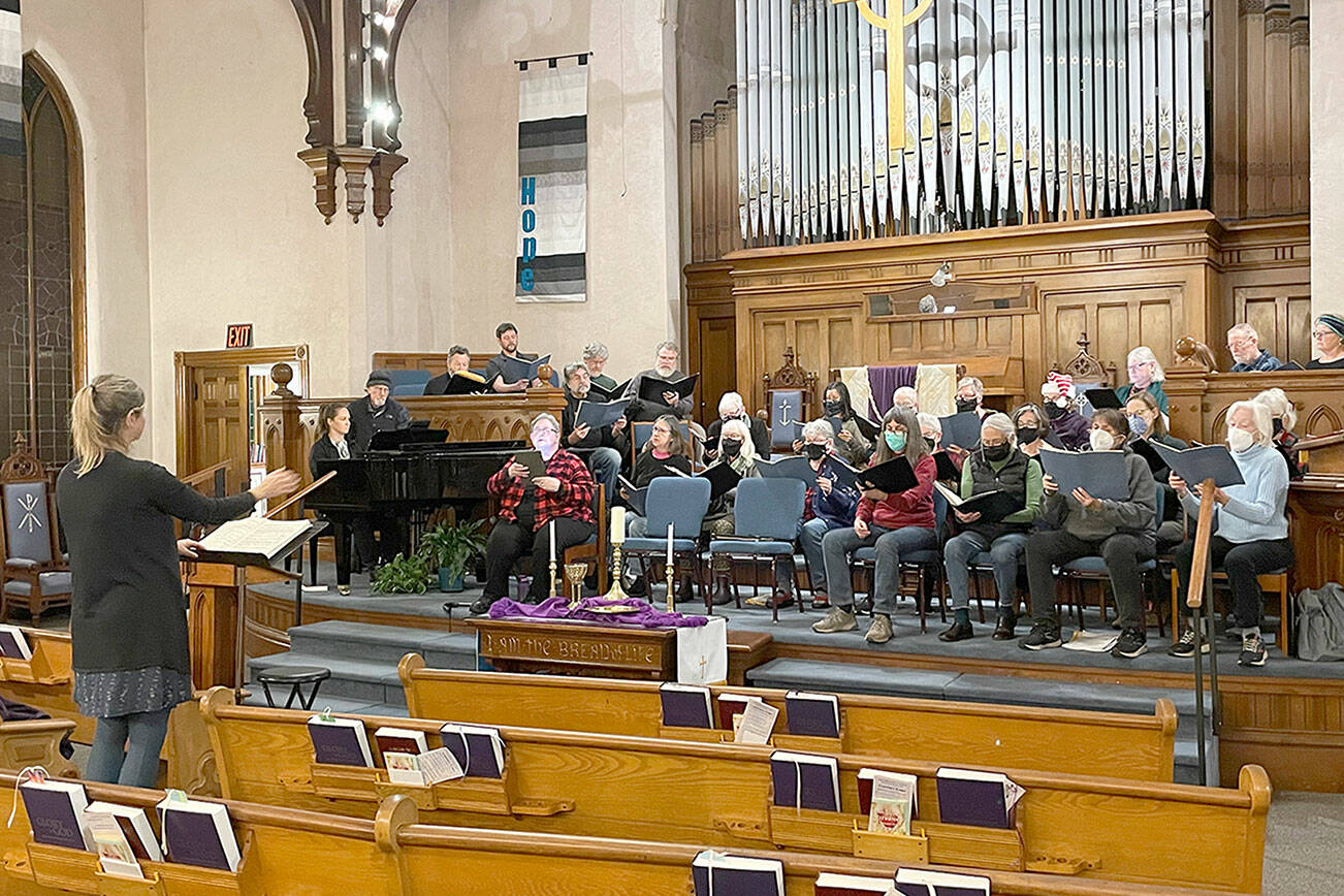 Director Sarah Moran rehearses the Community Chorus for a pair of holiday concerts in Port Townsend and Chimacum on Friday and Saturday. (Lynn Nowak)