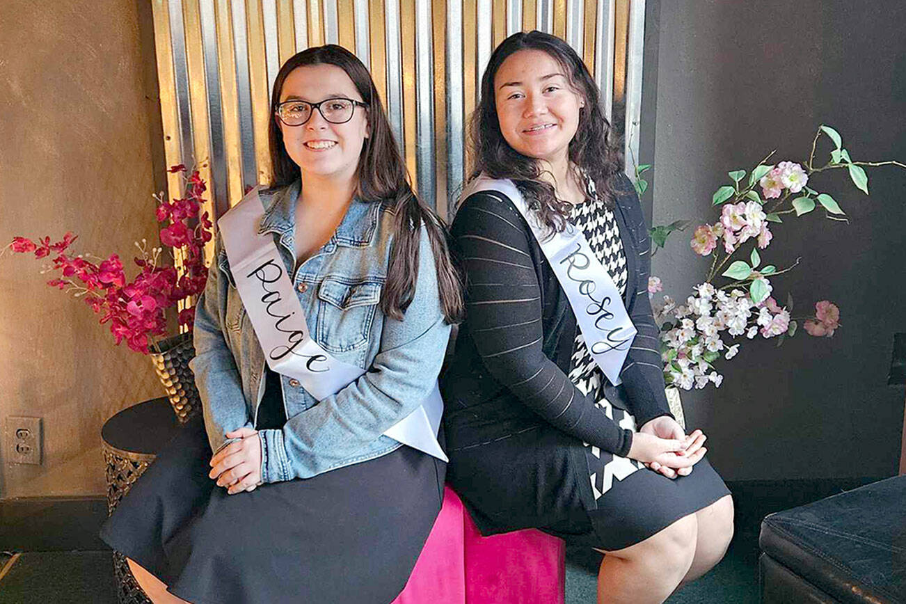 Paige Govia, 18, at left, and Rosey Schmucker, 17,, are competing for the 2024 Rhododendron Festival Queen crown.
