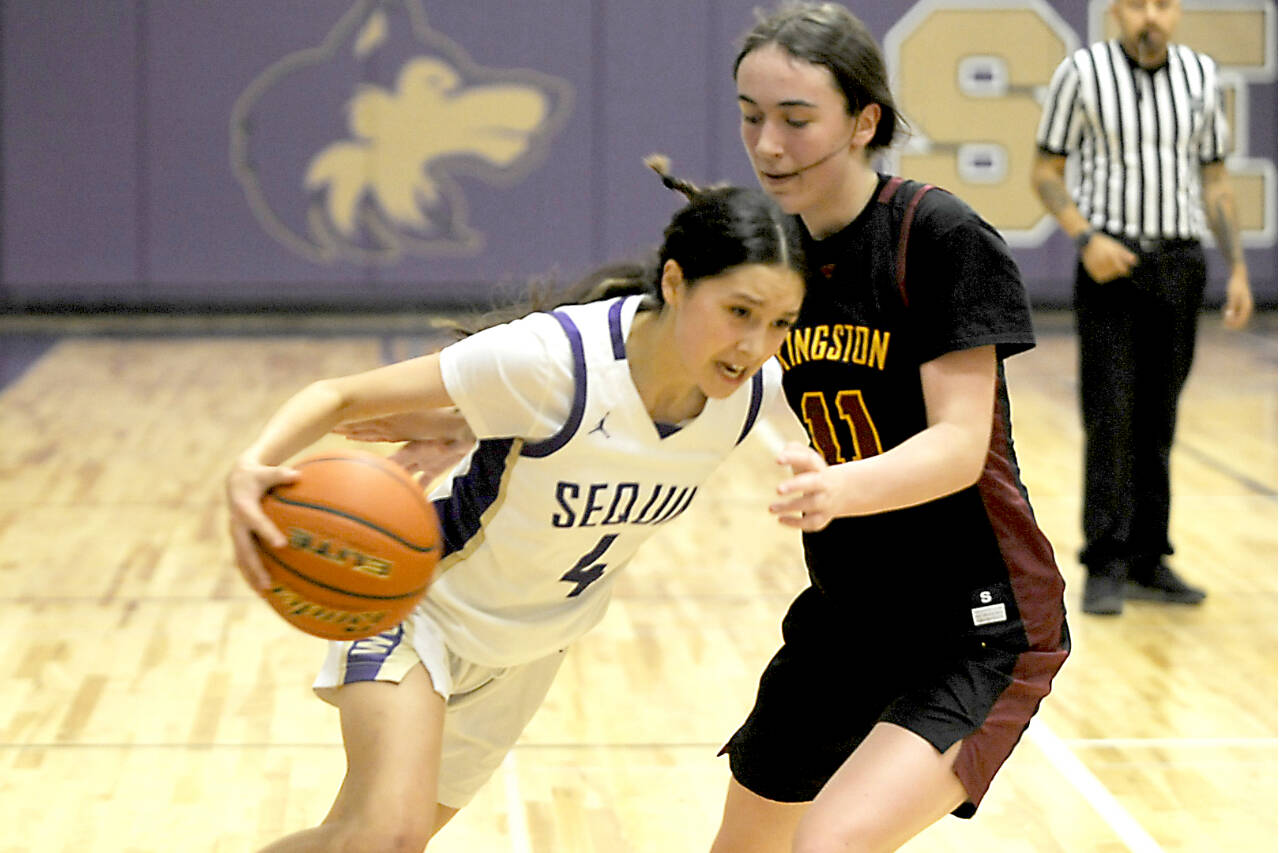 Sequim's Gracie Chartraw (4) drives against Kingston on Friday in Sequim. (Michael Dashiell/Olympic Peninsula News Group)