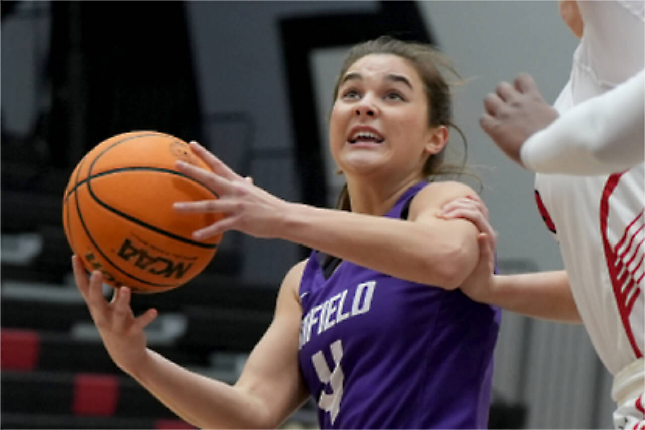 Port Angeles’ Eve Burke averaged 16 points a game over two games at the end of December for Linfield University in Oregon to be named the Northwest Conference Athlete of the Week. (Linfield University)