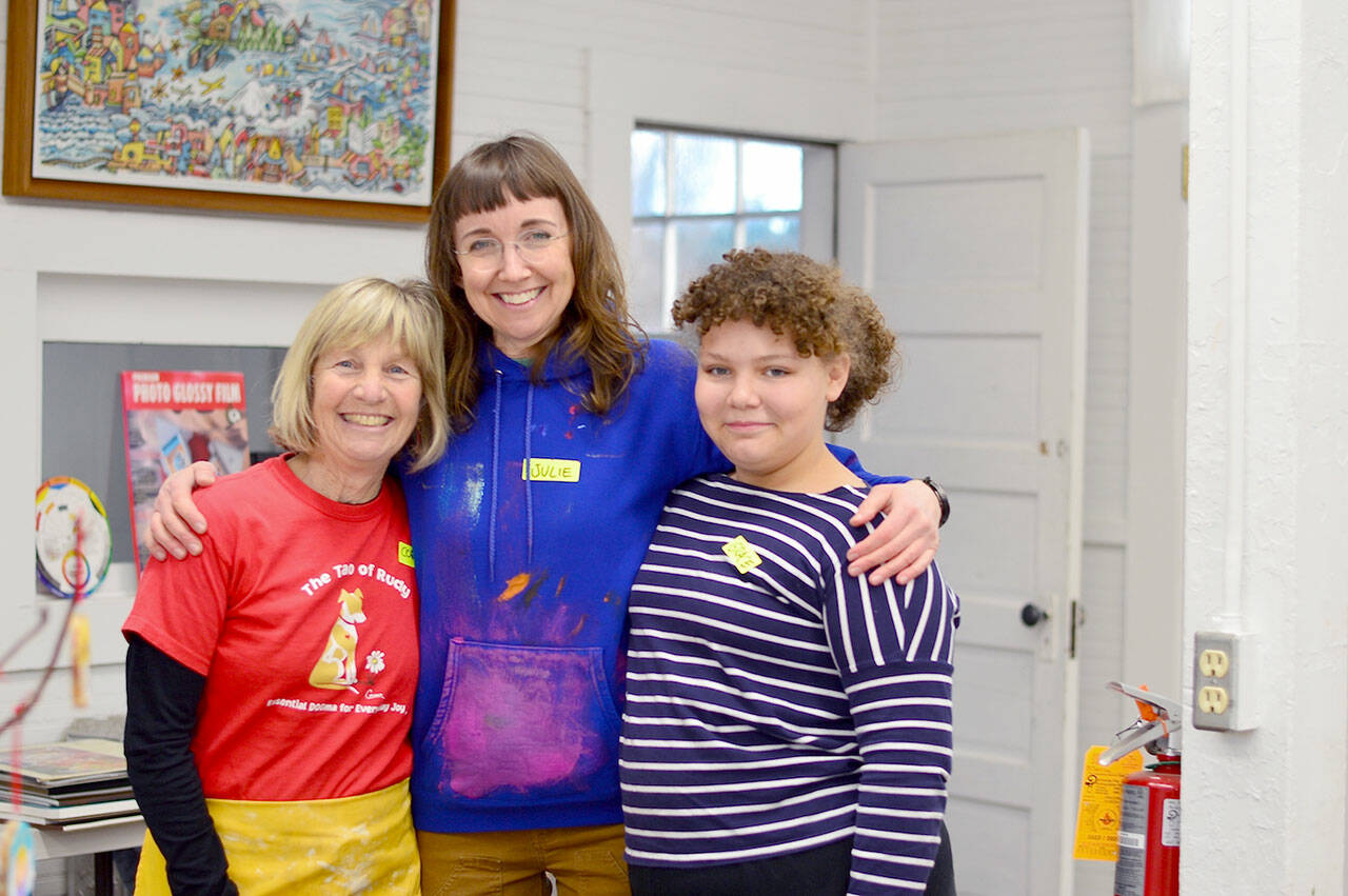 The Bunker, Northwind Art School’s free studio for teens, is every Friday now. Recent participants include, from left, volunteer artists Corinne Humphrey and Julie Read and middle school student Grace Black.