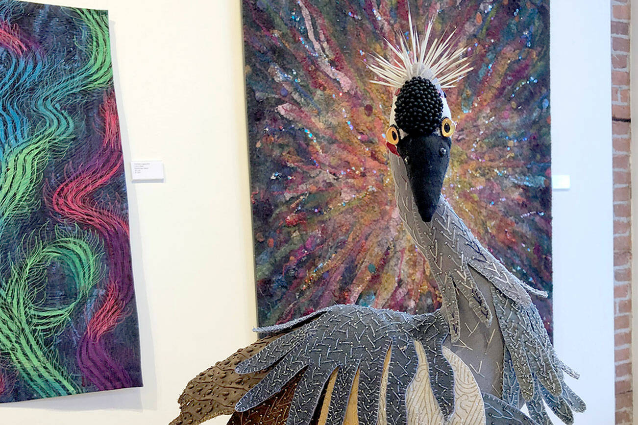 Pat Herkal’s “African Crowned Crane” is among the fiber art works in “Burst of Color,” the show at Northwind Art’s gallery in Port Townsend. (Diane Urbani/Northwind Art)