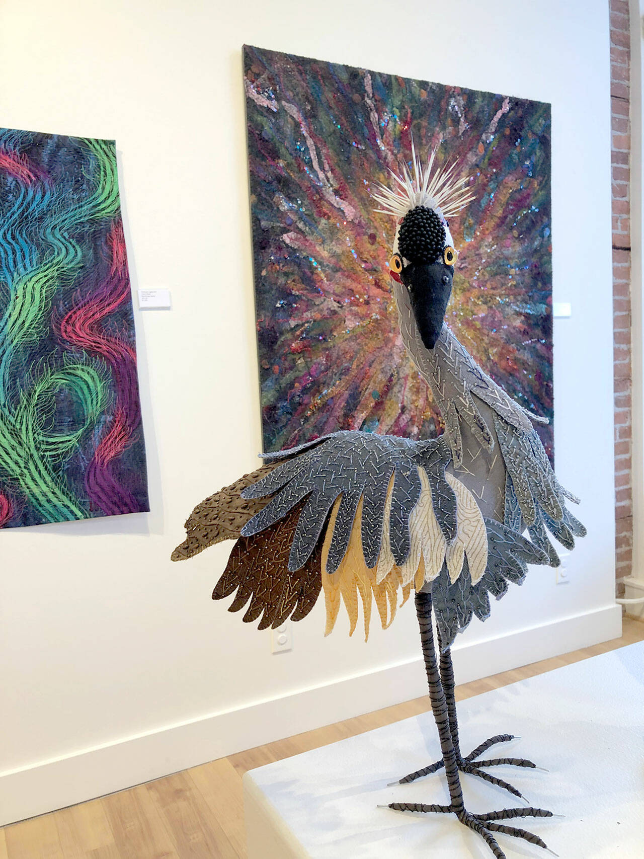 Pat Herkal’s “African Crowned Crane” is among the fiber art works in “Burst of Color,” the show at Northwind Art’s gallery in Port Townsend. (Diane Urbani/Northwind Art)