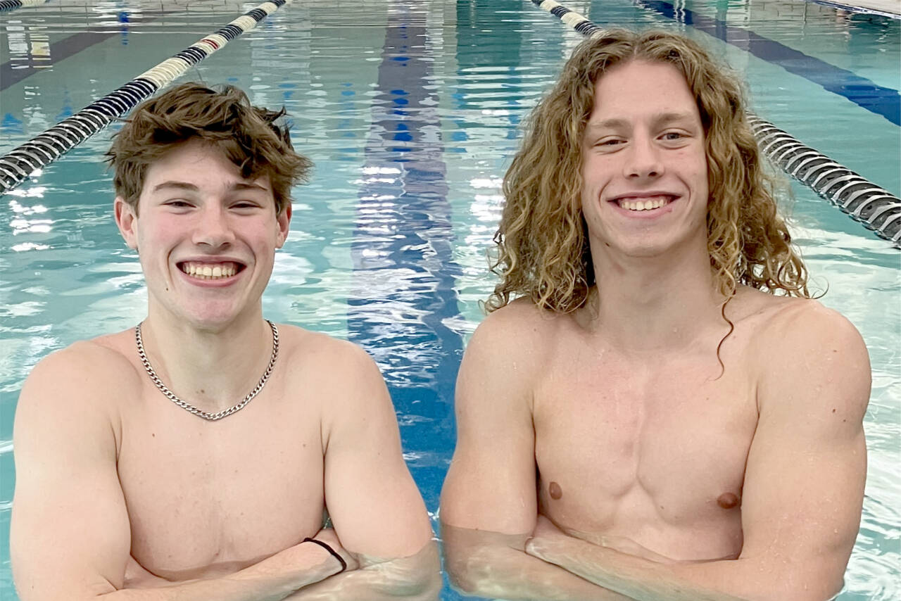 From left, Finn Thompson and Colby Ellefson members of the Port Angeles boys swim team.