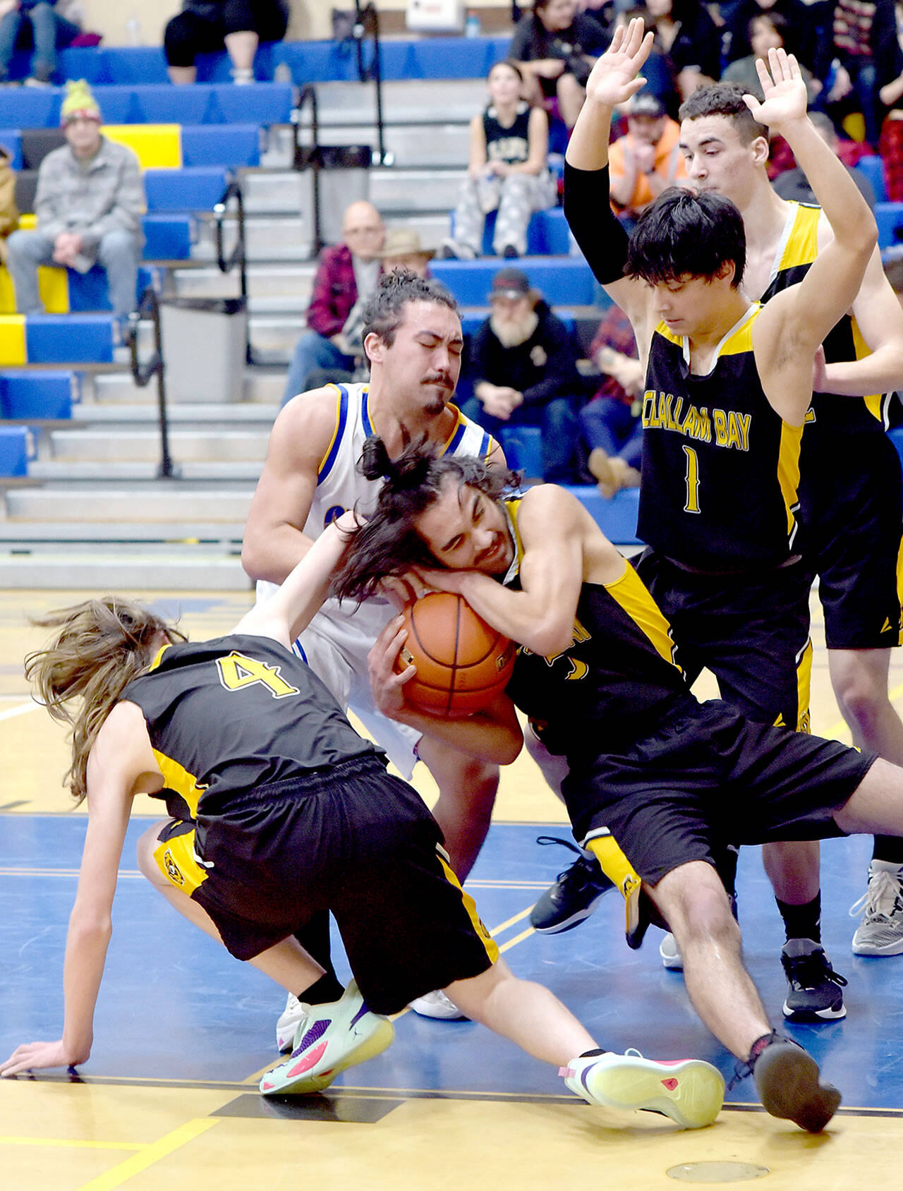 Crescents Peyton Watson fights for the ball with Clallam Bays Parker Prater, center, as Praters teammates, from left, Dylan Simmons, Mauncio Cruz-Lopez and William Hull try to avoid the fray on Tuesday night in Joyce. (Keith Thorpe/Peninsula Daily News)
