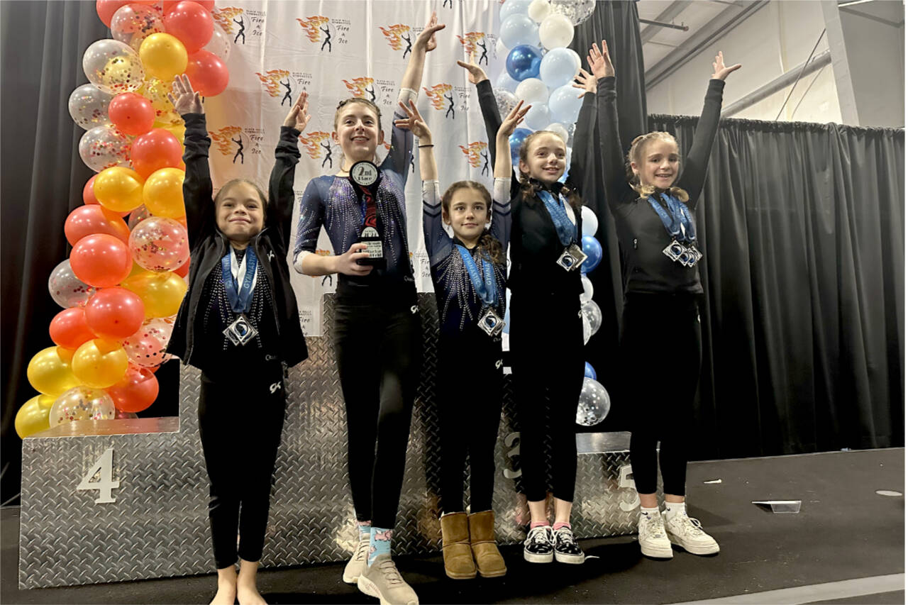The Klahhane Xcel gold team of, from left, Carly Mae Riggs, Gracelyn Goss, Paytynn Lindley, Lainey DePiro and Raynee Ciarlo finished second at the Fire and Ice Challenge in Lacey this weekend. (Klahhane Gymnastics)