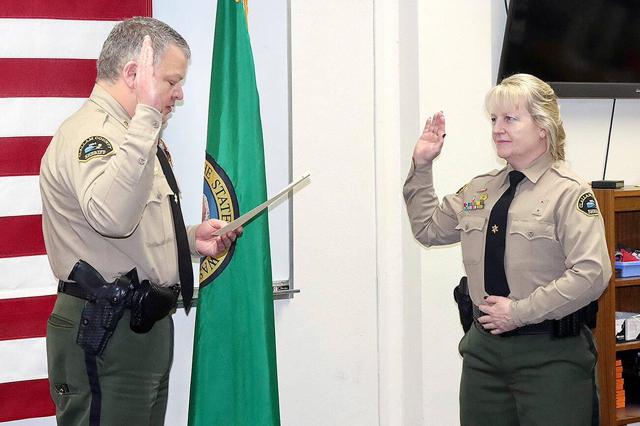 Dave Logan/for Peninsula Daily News
Lorraine Shore is sworn in as undersheriff by Clallam County Sheriff Brian King.