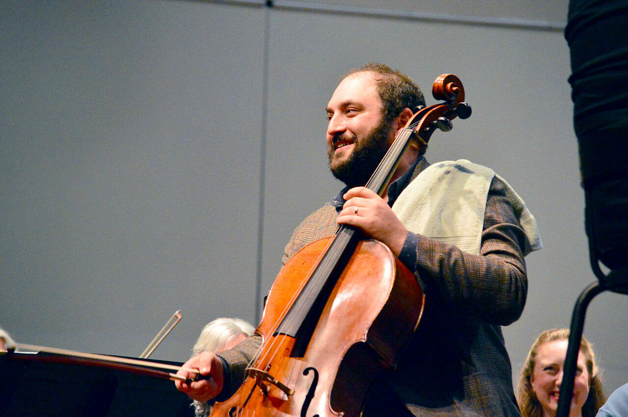 Cellist Julian Schwarz, pictured rehearsing in spring 2023, rejoins the Port Angeles Symphony Orchestra for two performances this Saturday. (Diane Urbani de la Paz/Port Angeles Symphony)