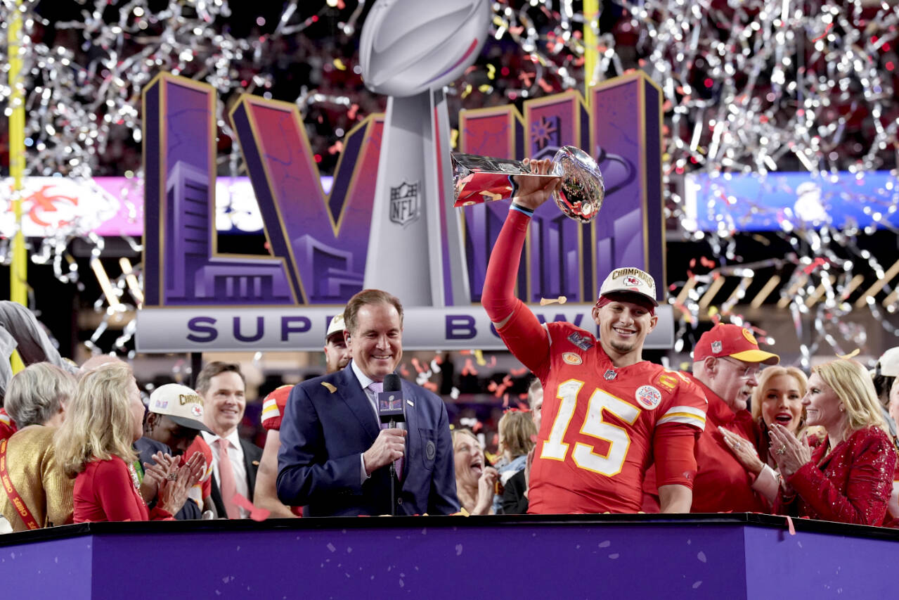 Kansas City Chiefs quarterback Patrick Mahomes (15) holds the Vince Lombardi Trophy after the NFL Super Bowl 58 football game against the San Francisco 49ers on Sunday, Feb. 11, 2024, in Las Vegas. The Chiefs won 25-22. (AP Photo/John Locher)