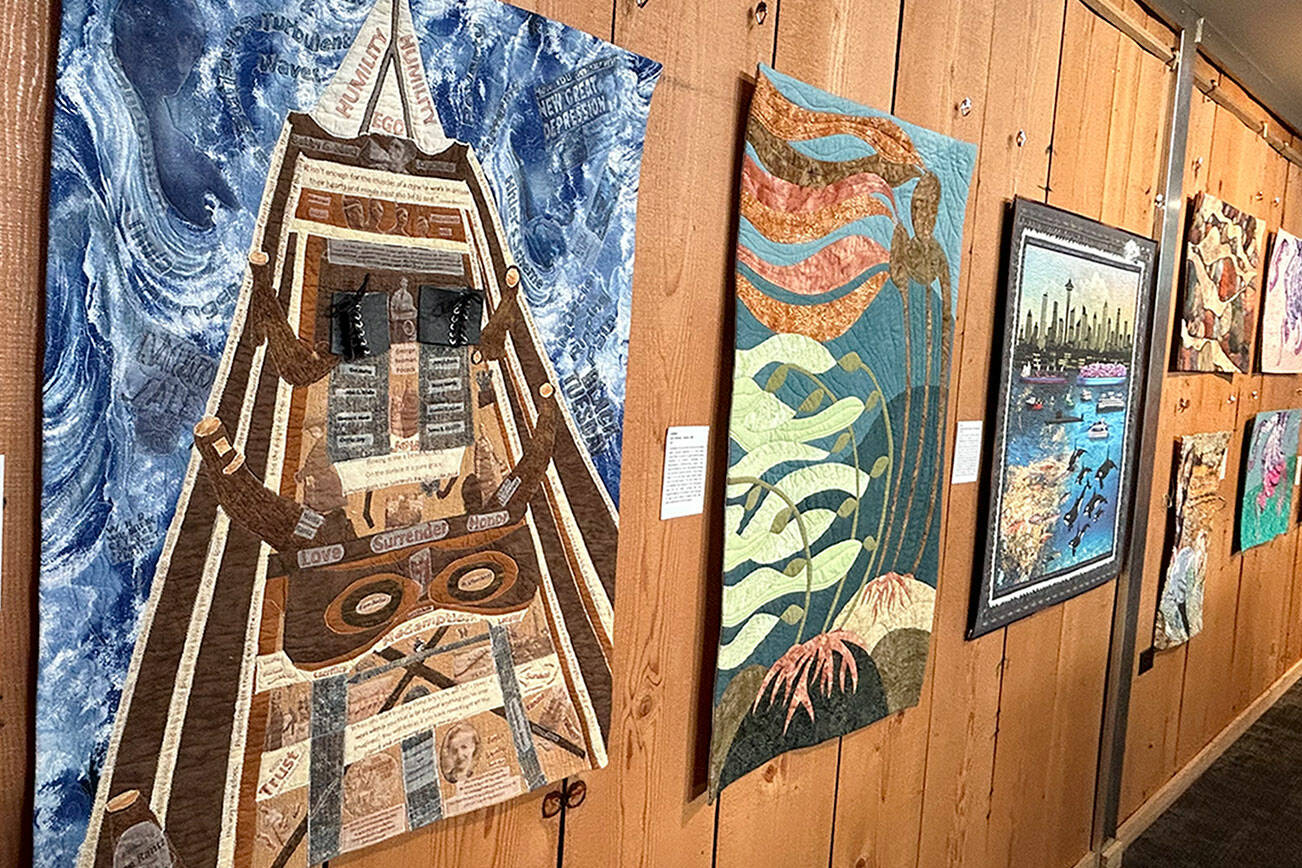 “Against all Odds: Abandonment to Olympian, A Tribute to Joe Rantz” by Catherine Bilyard is one of 41 quilts on display in Sequim Museum & Arts through the end of March as part of the “Inspiration/Exploration” exhibit. (Matthew Nash/Olympic Peninsula News Group)
