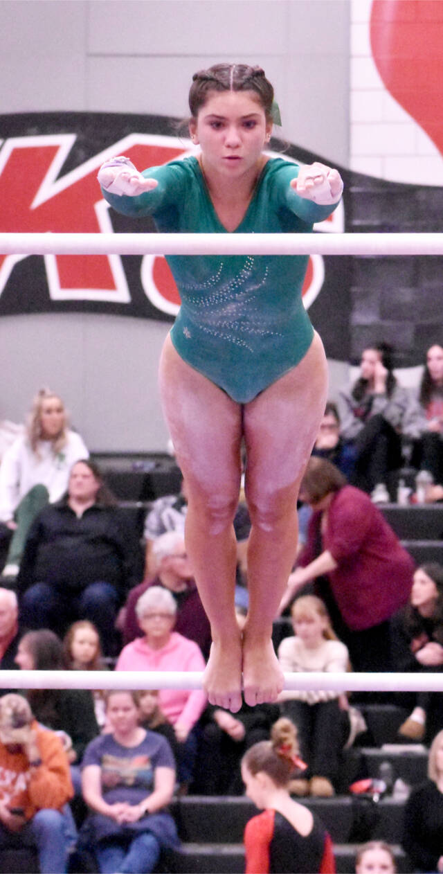Kevin Hanson/Enumclaw Courier-Herald
Scarlett Sullivan of Port Angeles competes in the bars at the state gymnastics meet at Sammamish High School.
Scarlett Sullivan of Port Angeles competes in the bars at the state gymnastics meet at Sammamish High School. (Kevin Hanson/Enumclaw Courier-Herald)