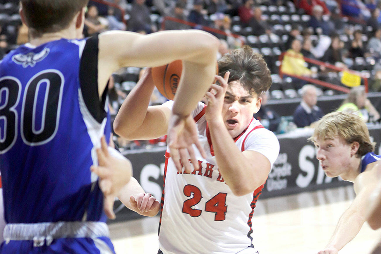 Roger Harnack/Cheney Free Press
Neah Bay's Tyler Swan drives to the hoop during the Red Devils Class 1B State Boys Basketball Tournament opener against Oakesdale at the Spokane Arena.